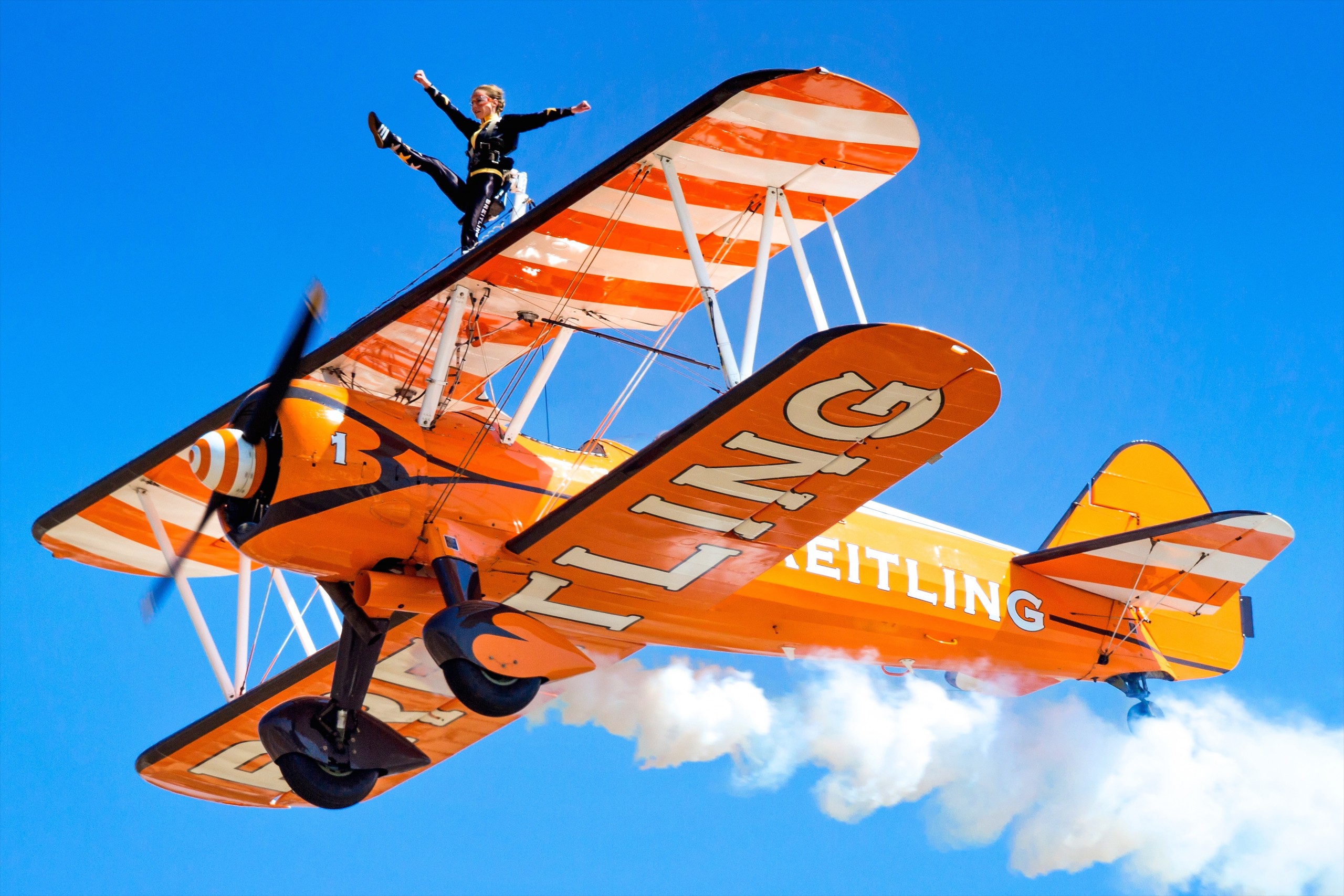 A wing walker on a biplane