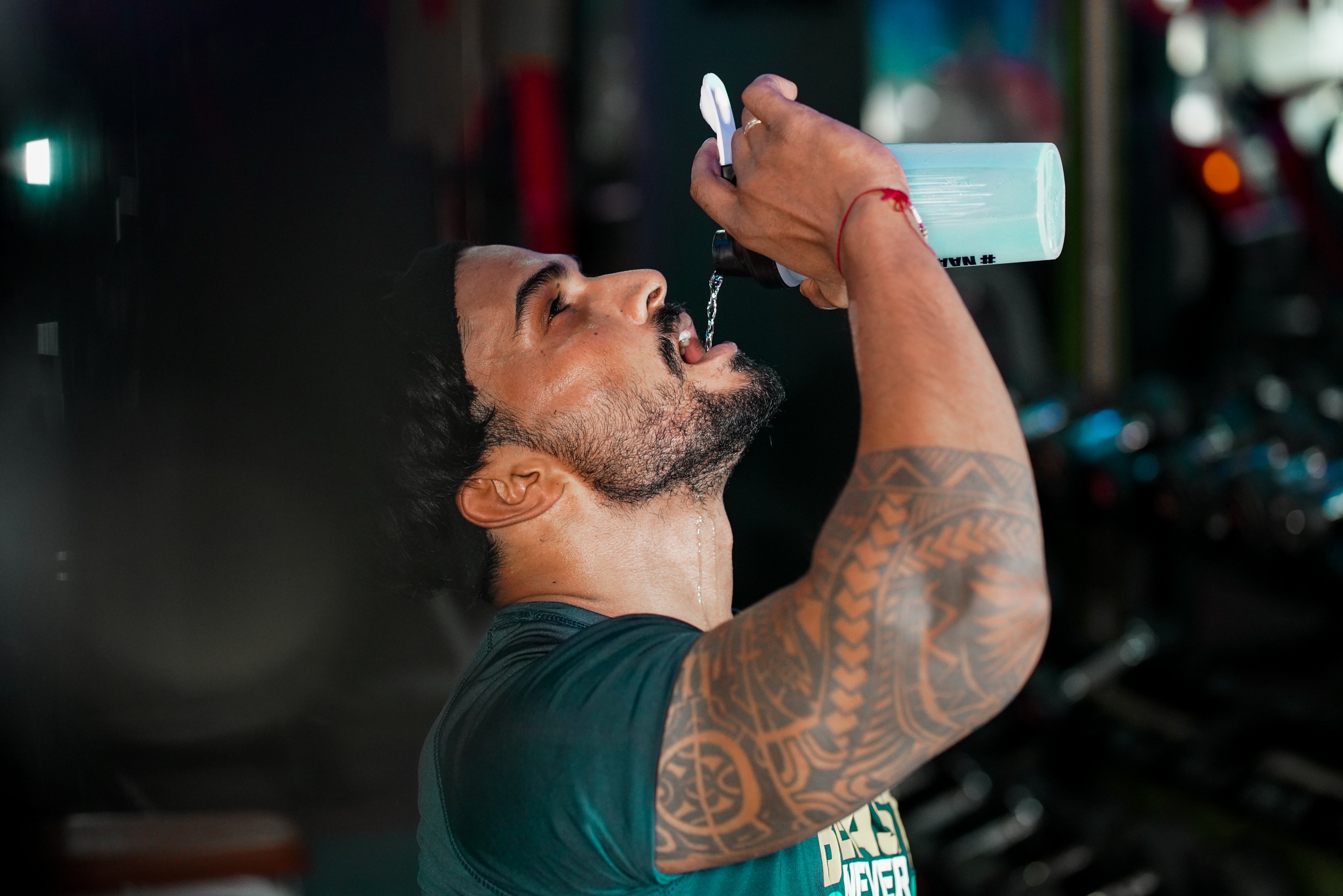 Bodybuilder drinking water