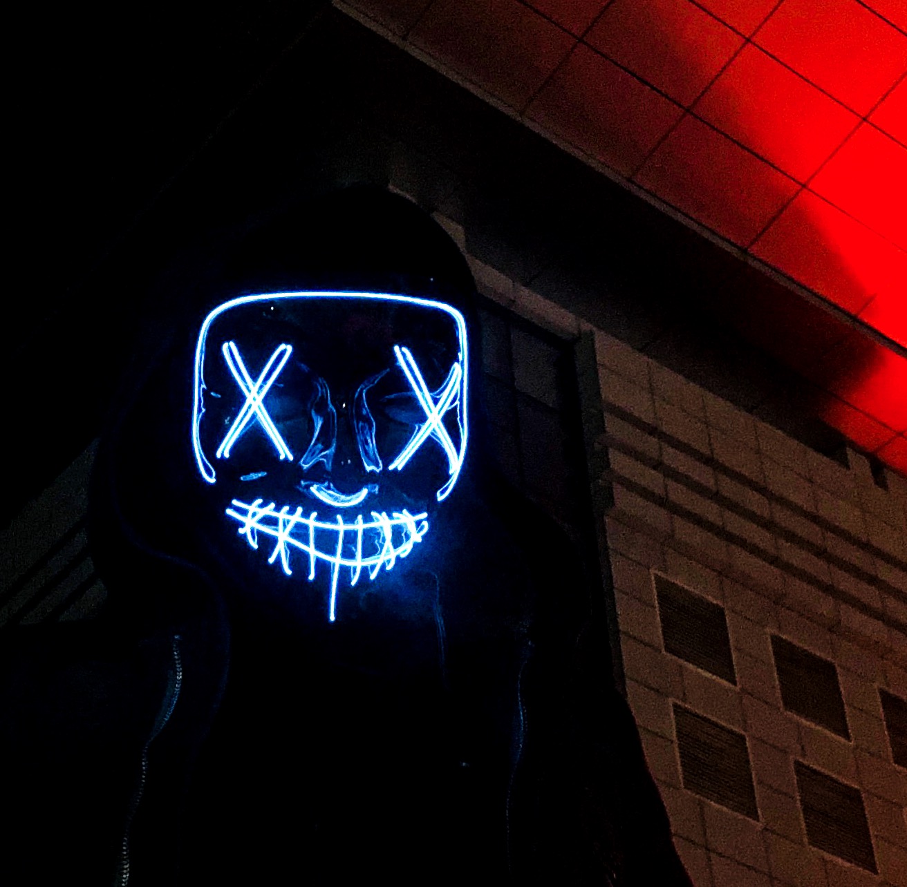 Creepy mask glowing in the dark