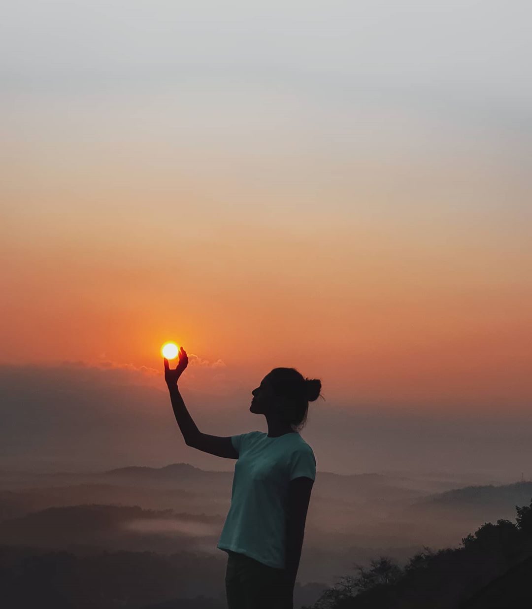 Grabbing the Sun with Hand