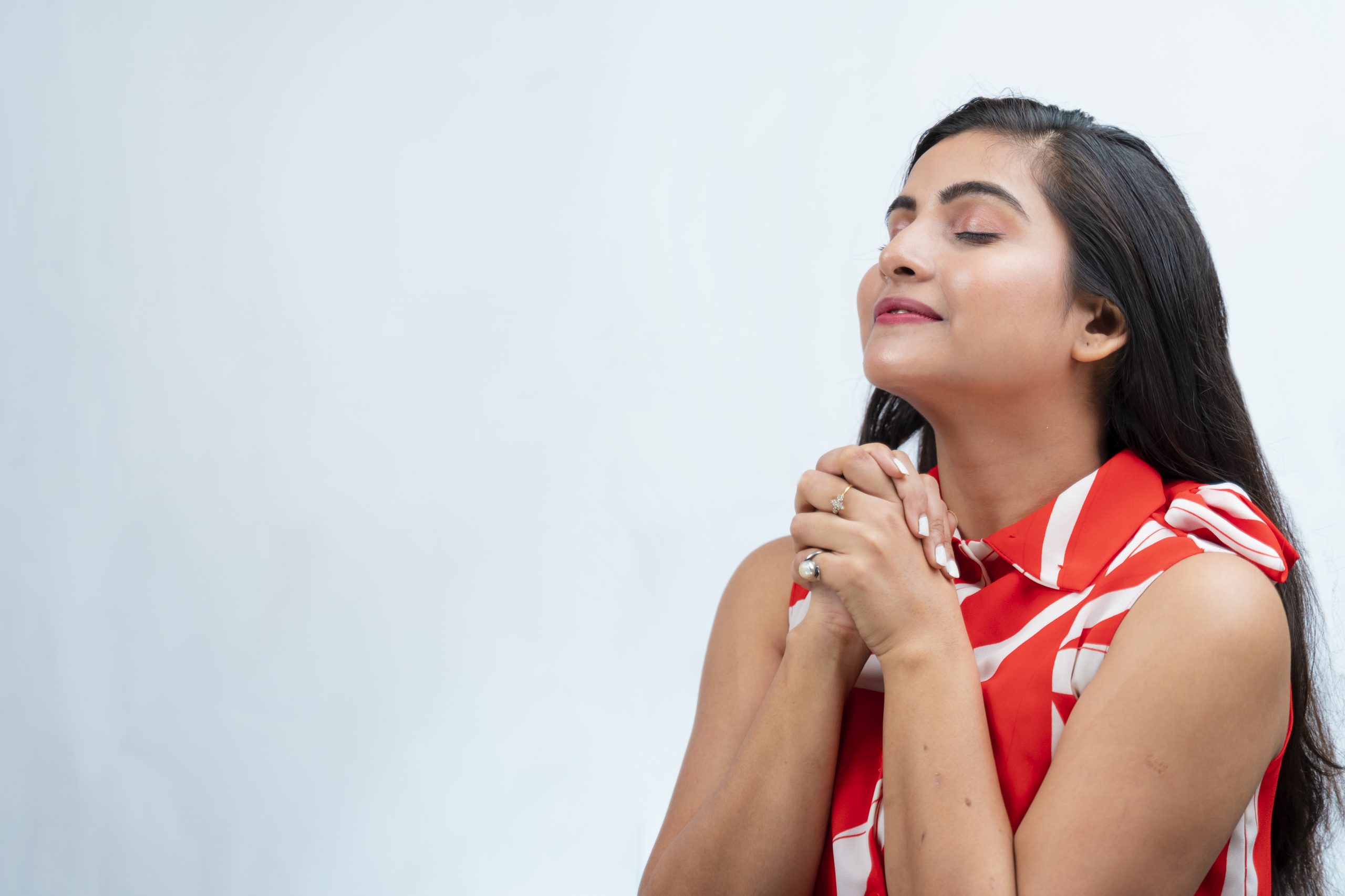 Indian girl praying on White Background