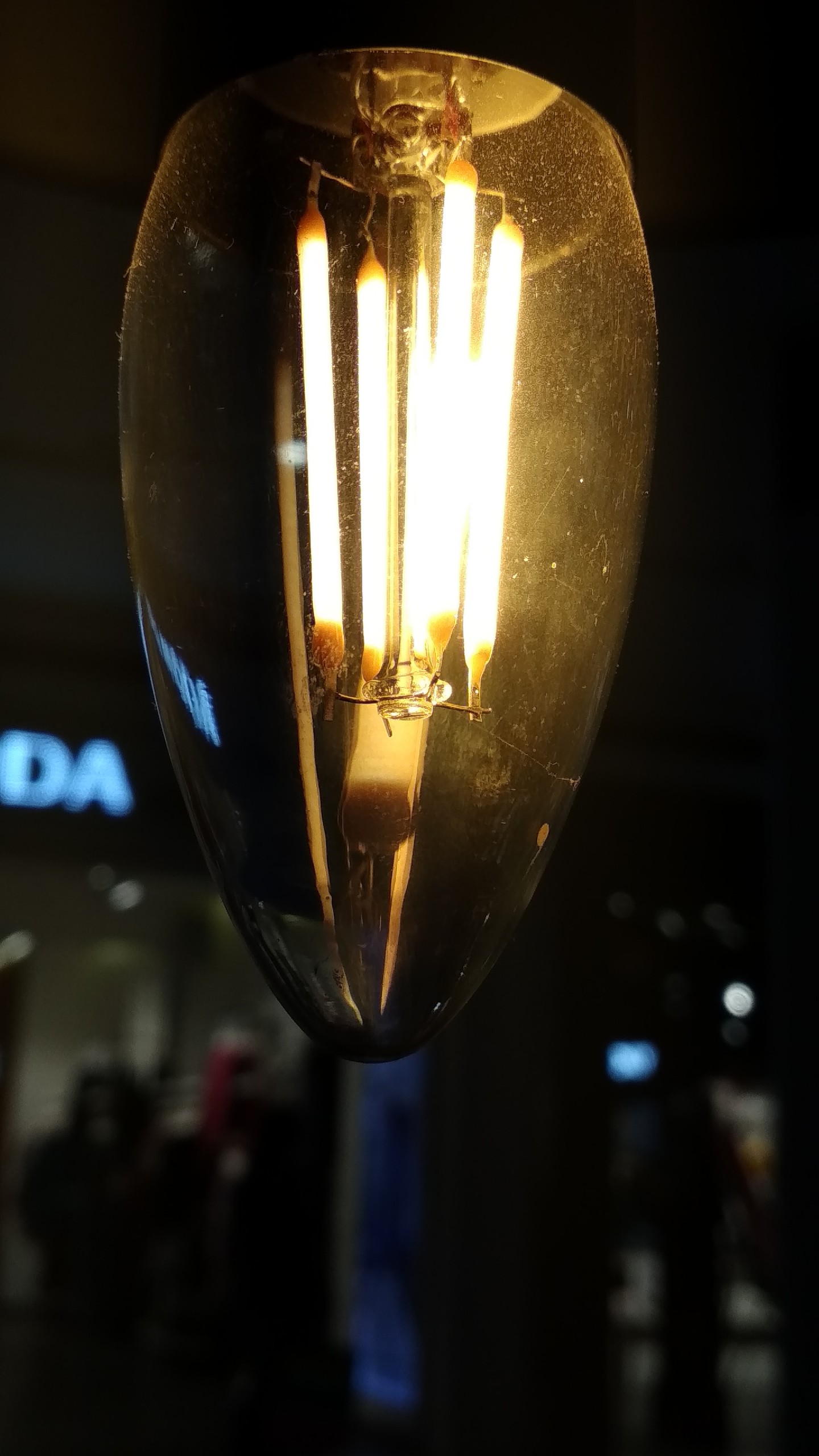A light bulb in the night.