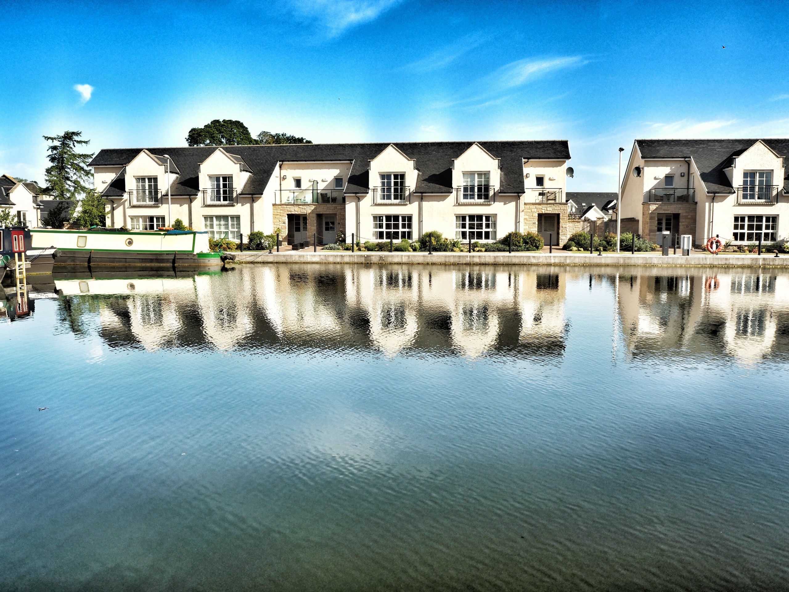 Row of houses in front of a lake