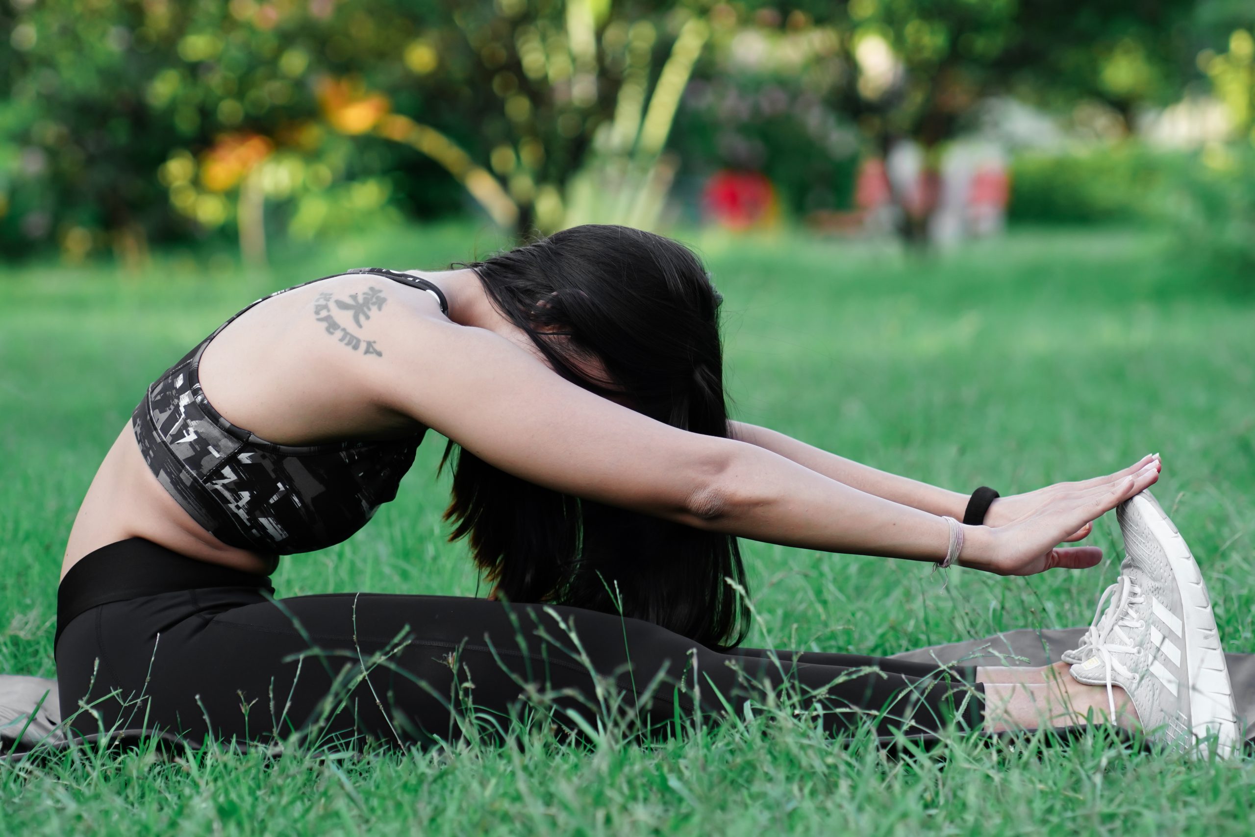 Woman doing yoga in the park