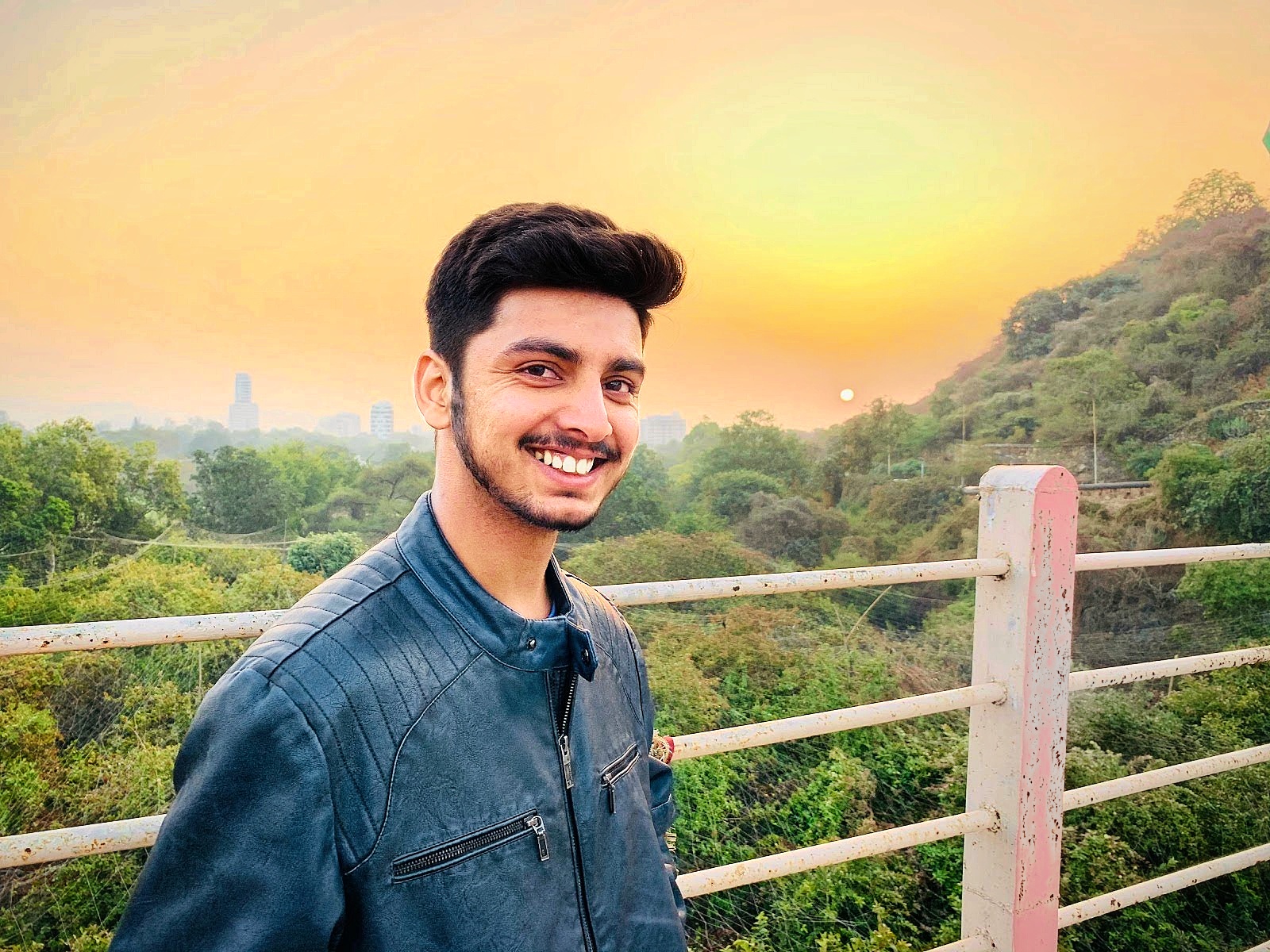 Young Indian Boy with Sunrise in Background