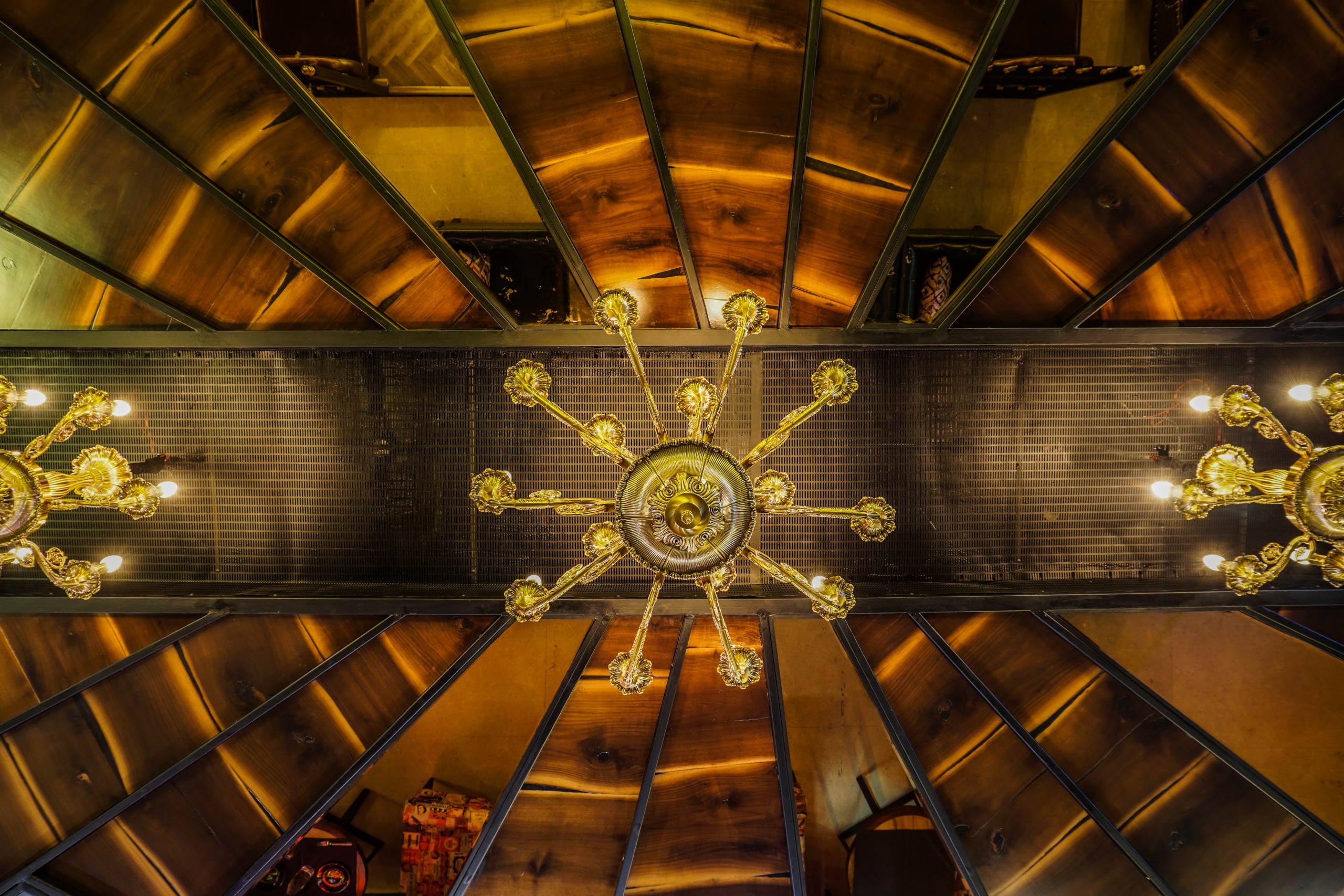 a kaleidoscopic roof with mirrors and chandelier