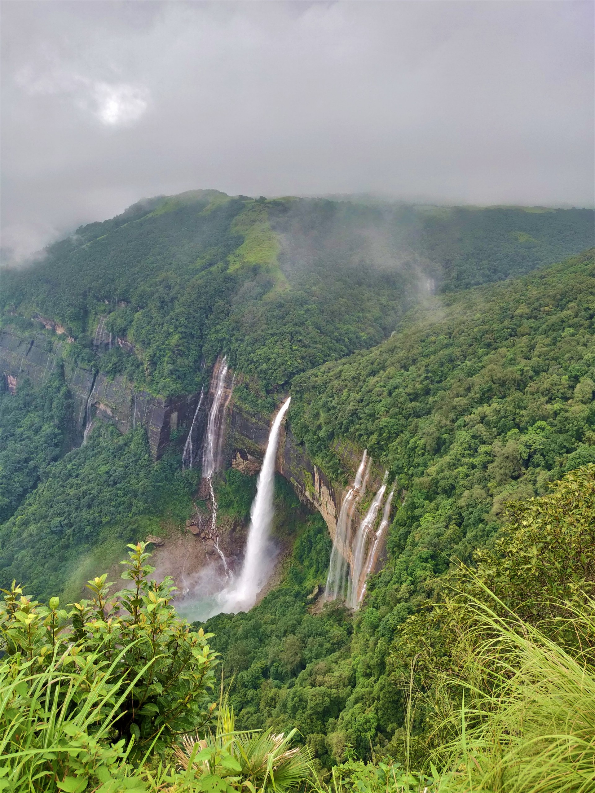 Waterfall among Green Hills