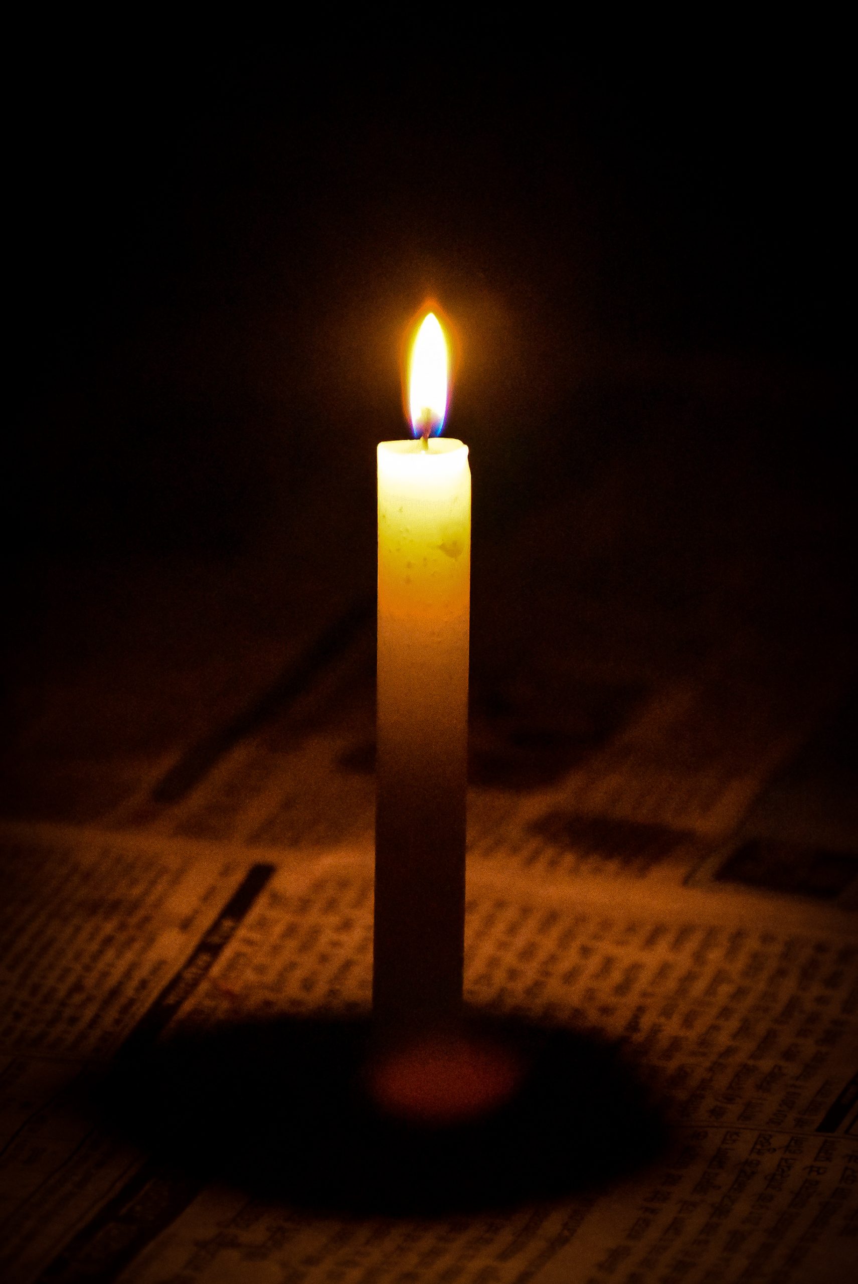 A Standing Lighted Candle