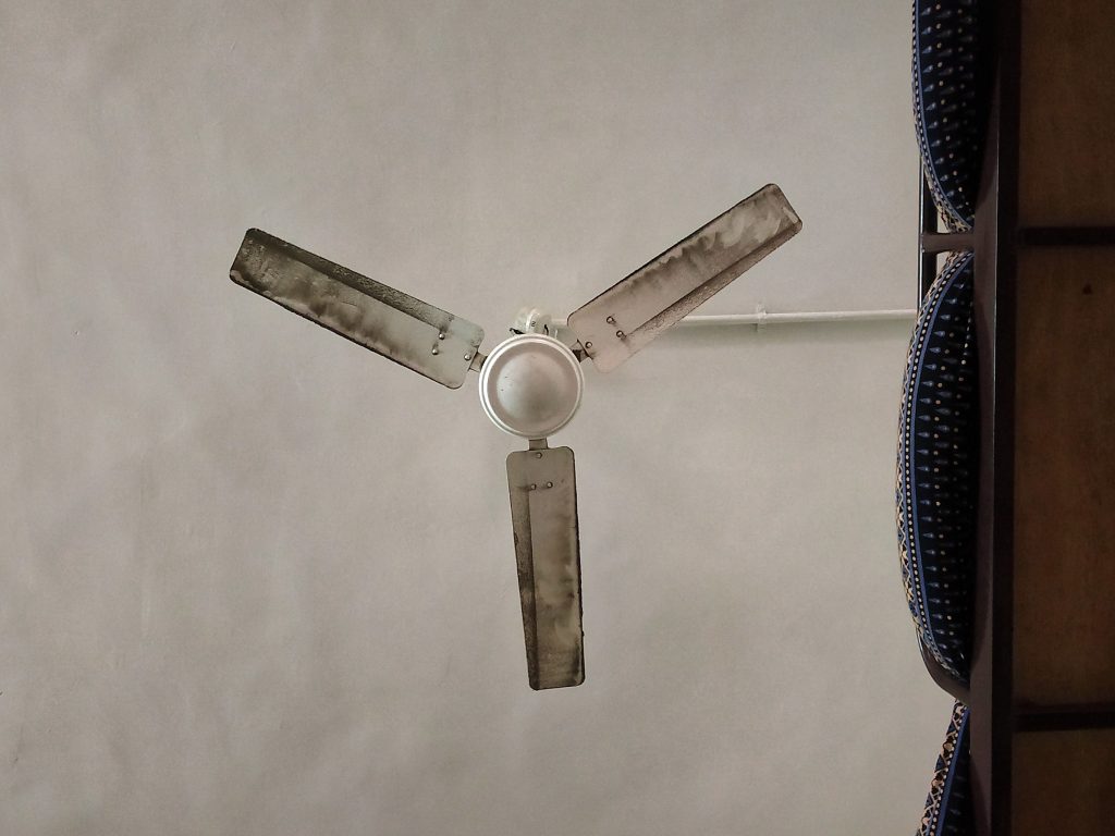 A dirty fan in a room PixaHive