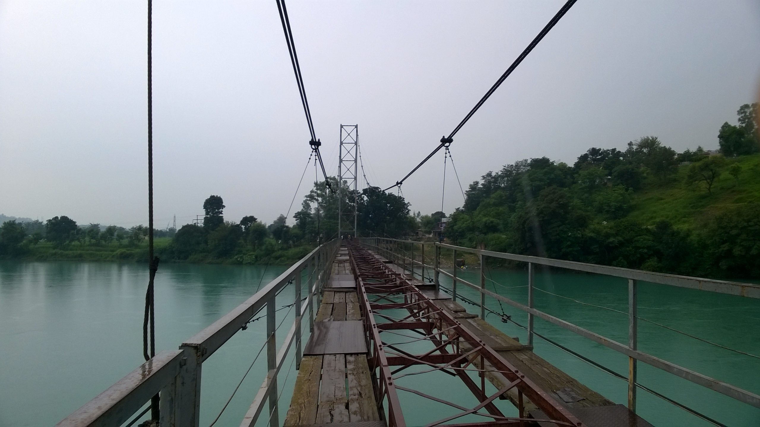 A suspension bridge over a river