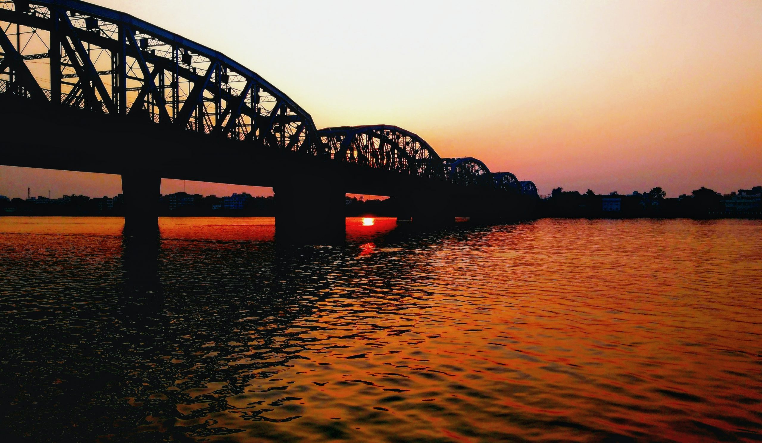 Arch Bridge on the River Sunset