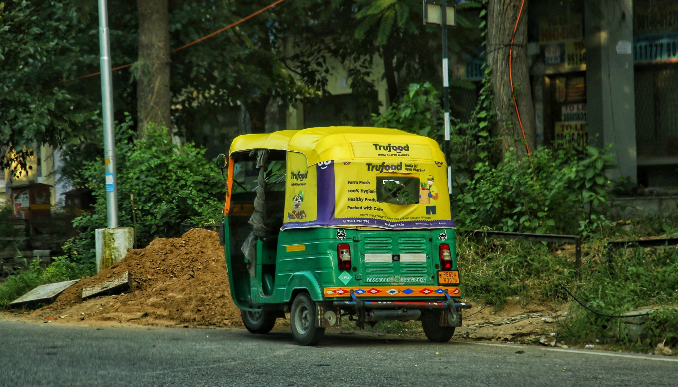 An autorickshaw on the road.