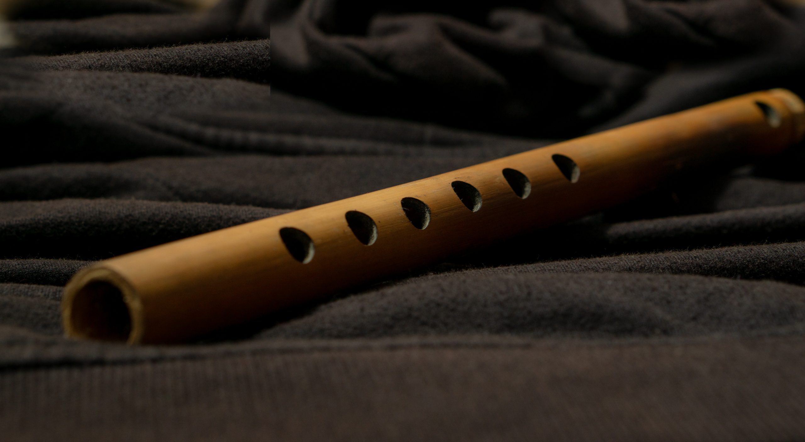 Bamboo flute on a black background