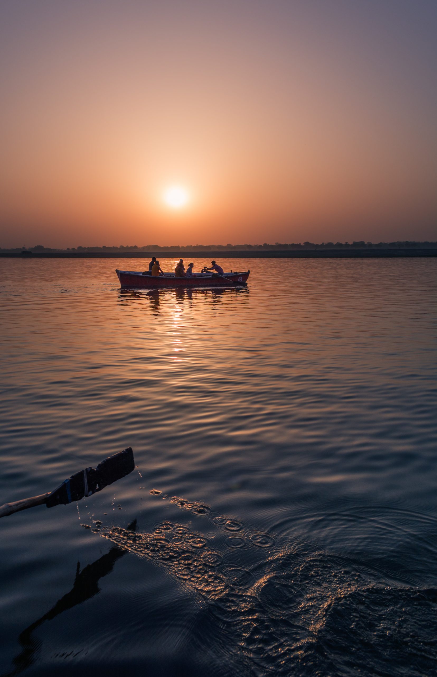 Boat sailing during sunrise