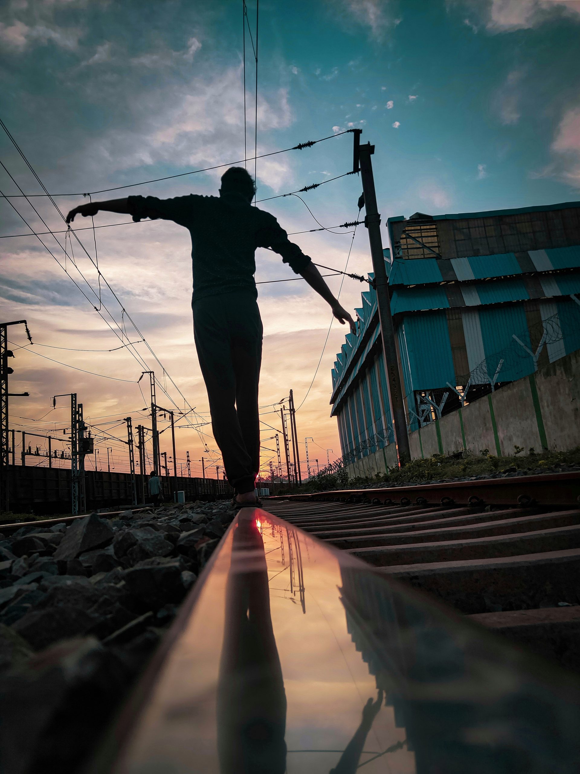 Boy in railway line