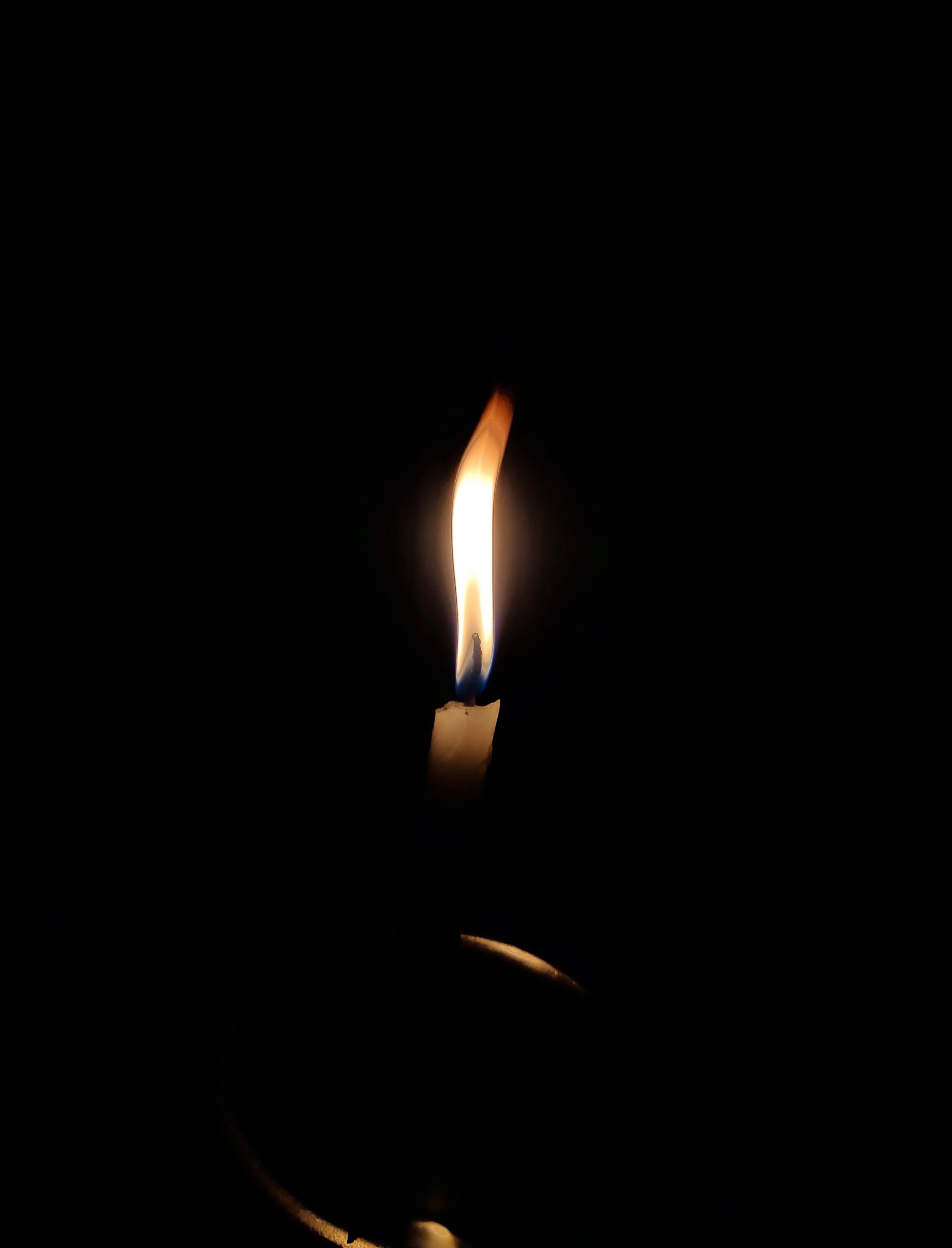 Candle Flame in the Dark on Focus