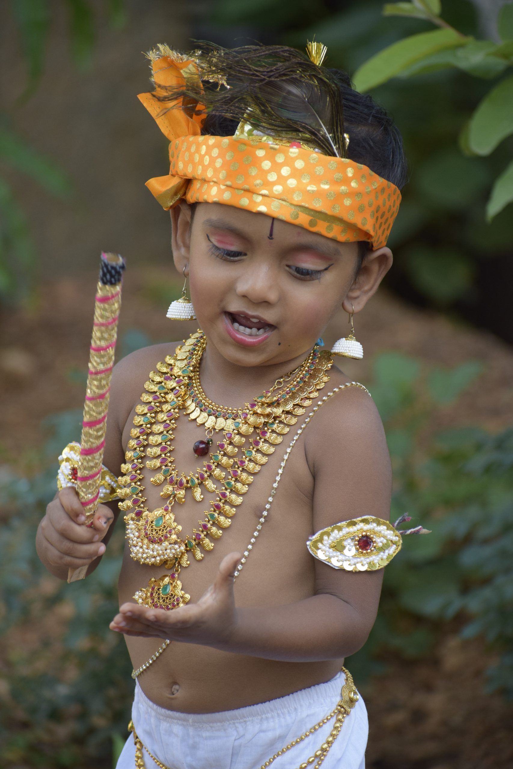 Child wearing Lord Krishna costume