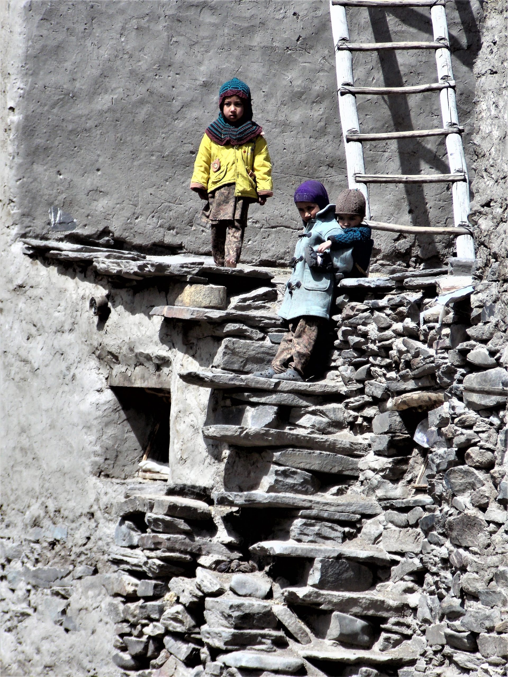 Children on a rocky stair