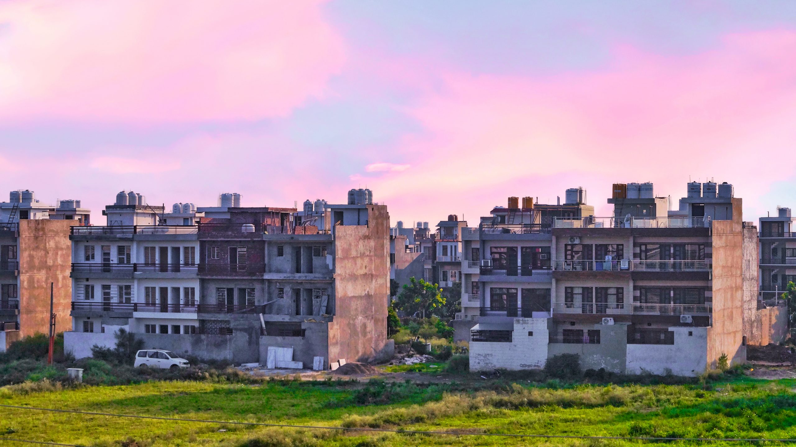 Pink sky and housing apartments