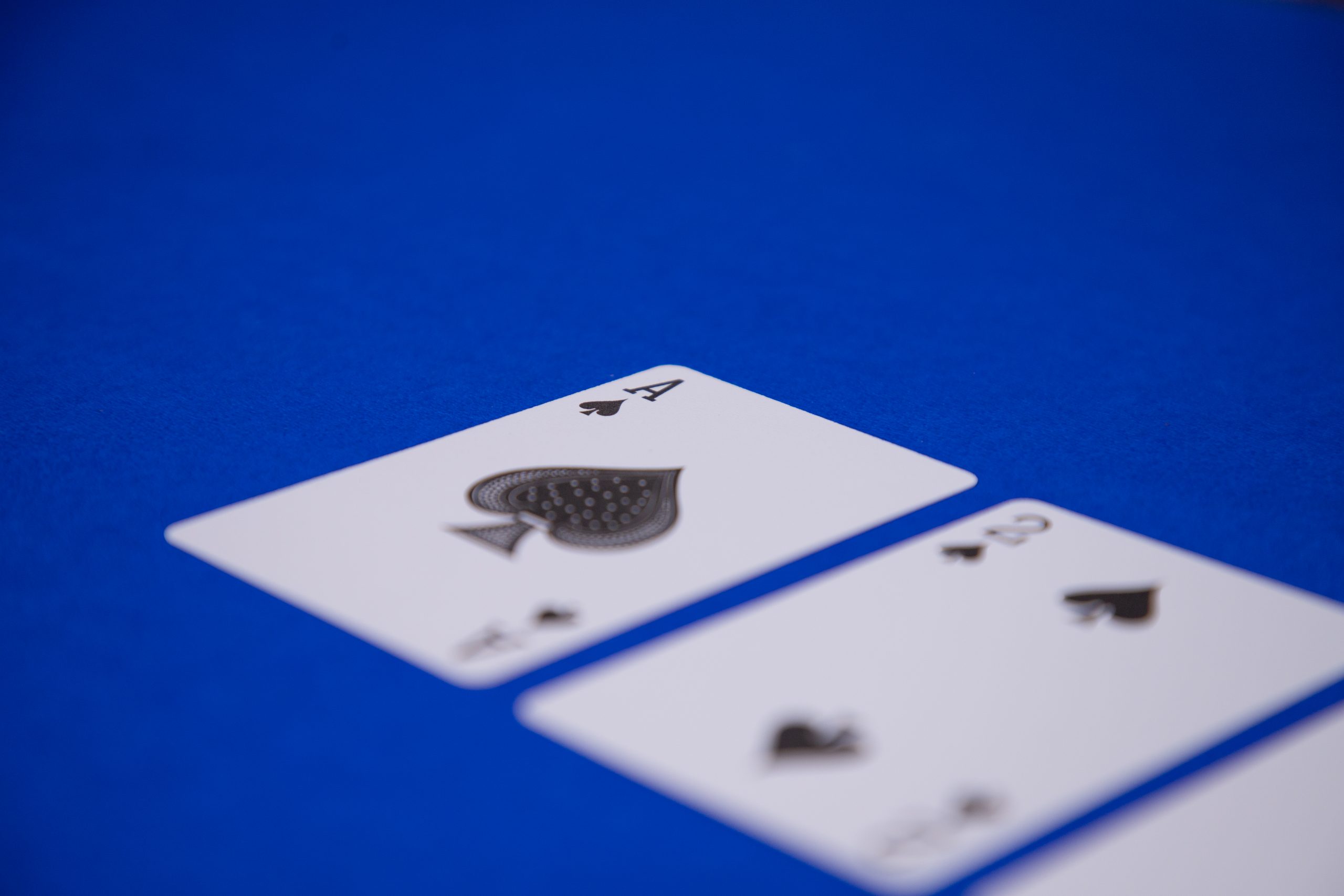 Closeup of playing cards with focus on ace of spades