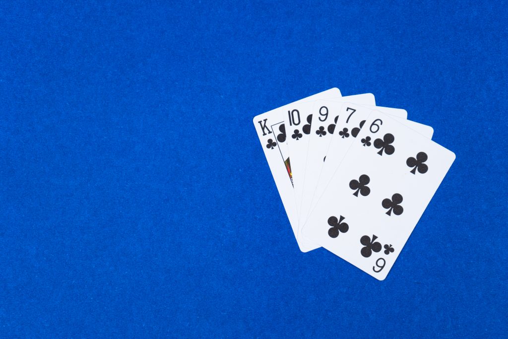 poker hand flush 5 letters