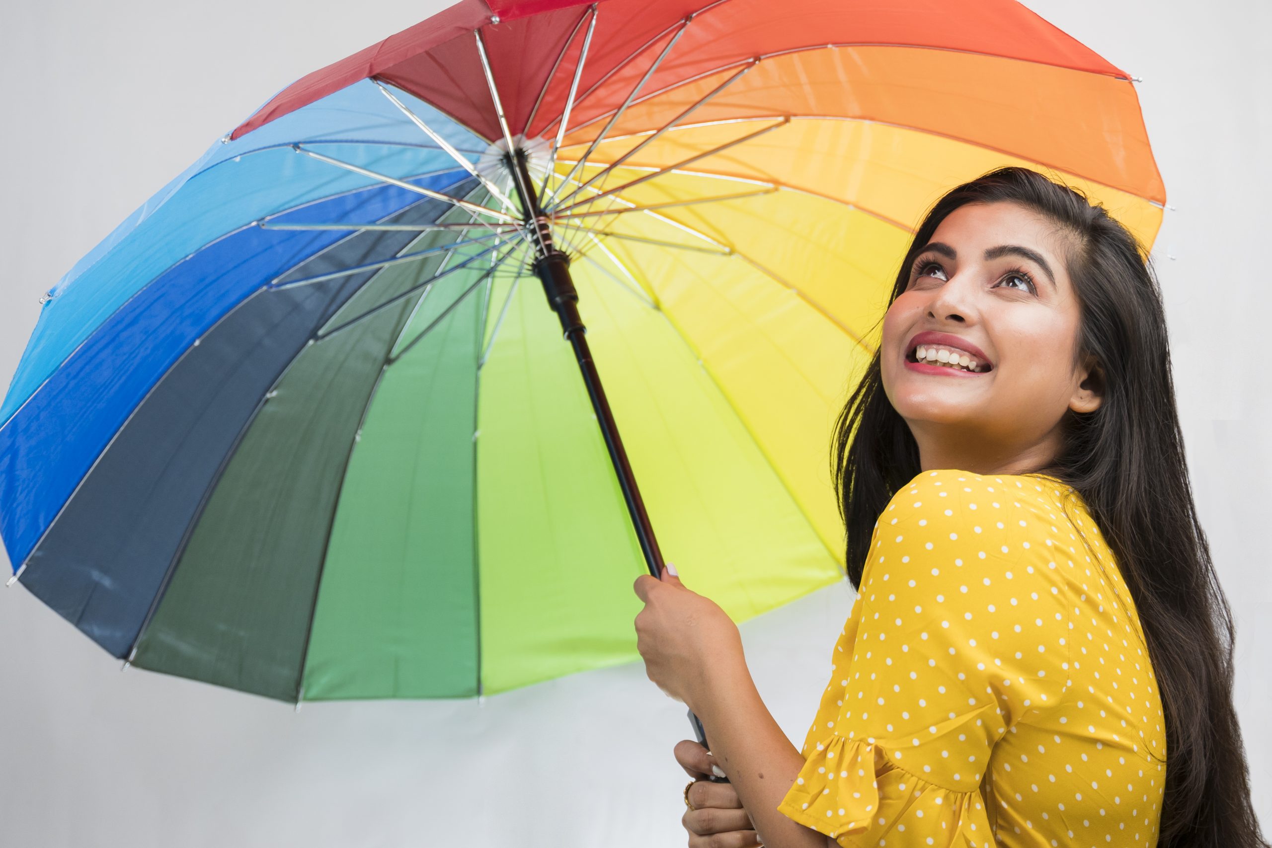 Girl with a colourful umbrella