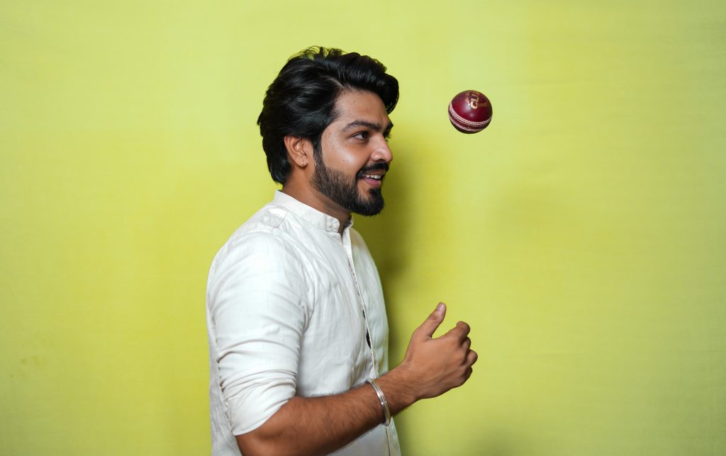 Handsome Man playing with cricket ball - PixaHive