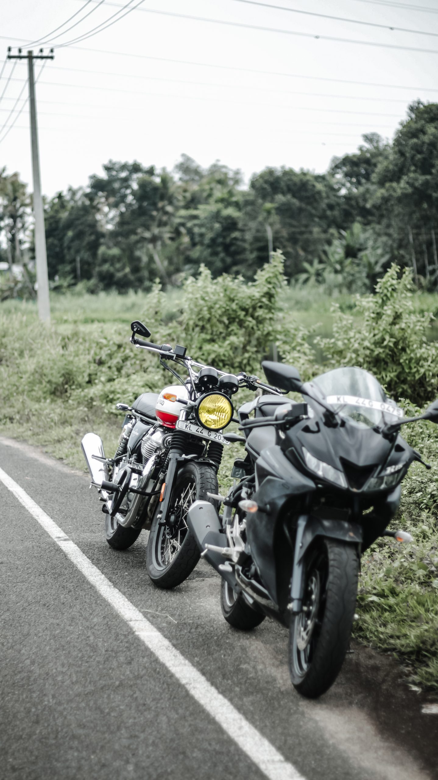 Heavy engine bikes beside a road