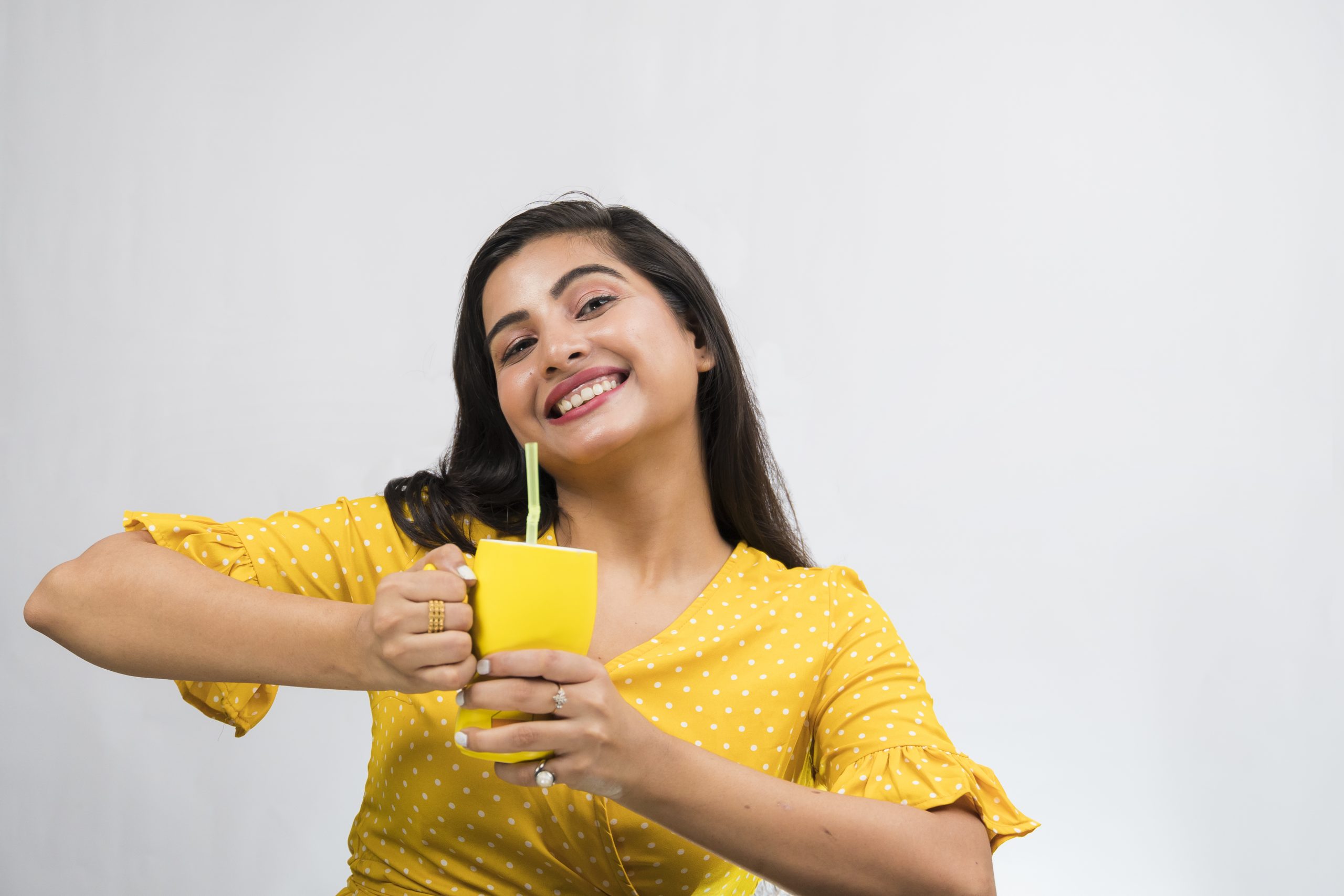 Indian girl posing with mug