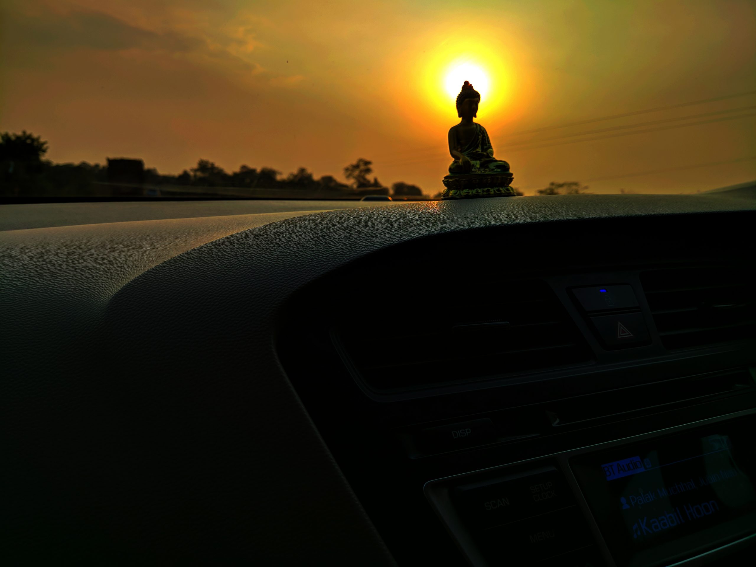 buddha idol against sunlight