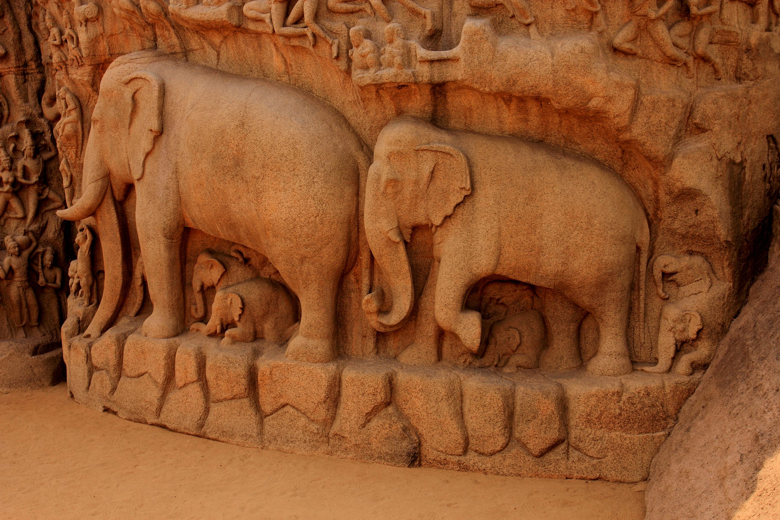 carved wall with elephants