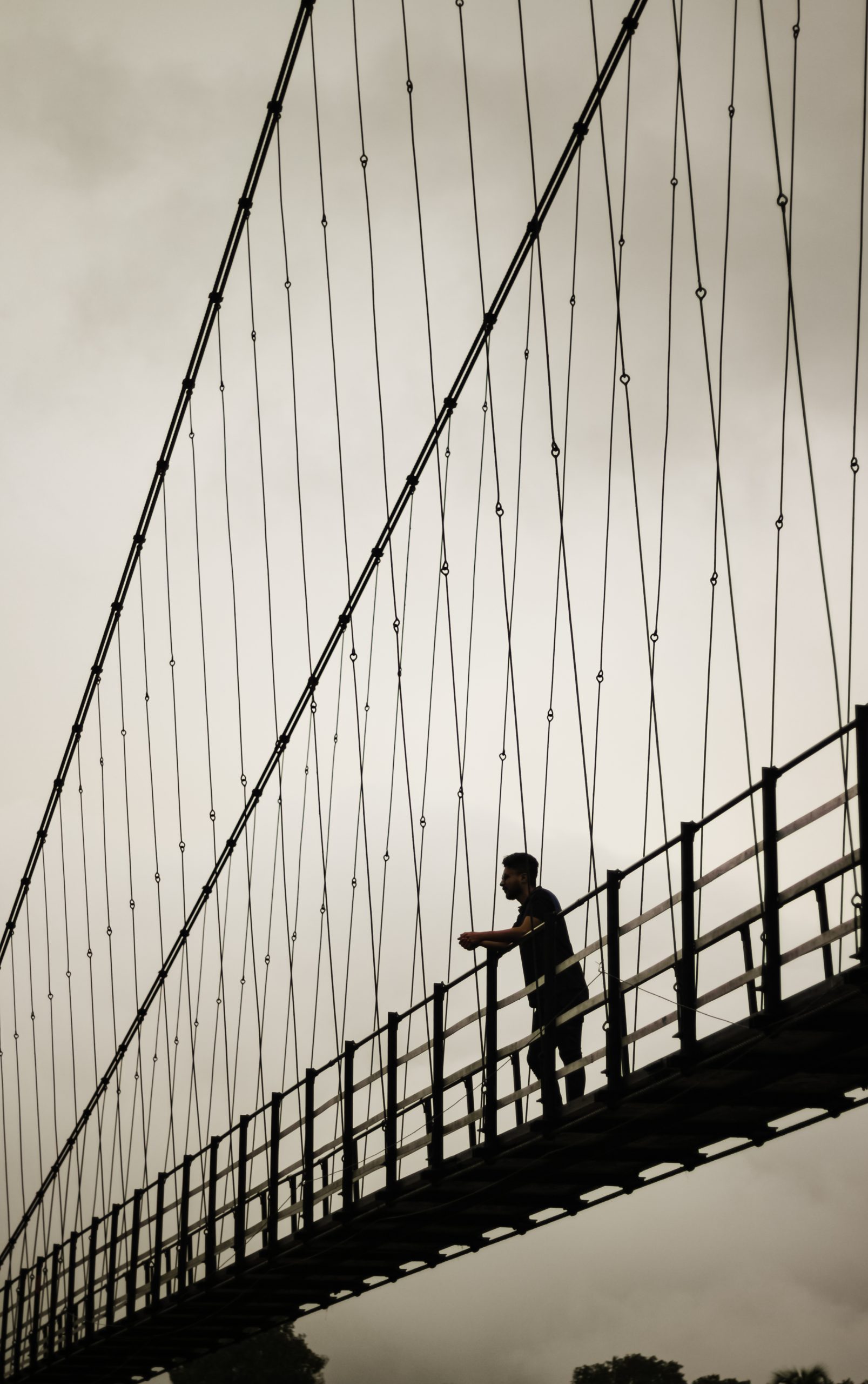 Man on the hanging Bridge