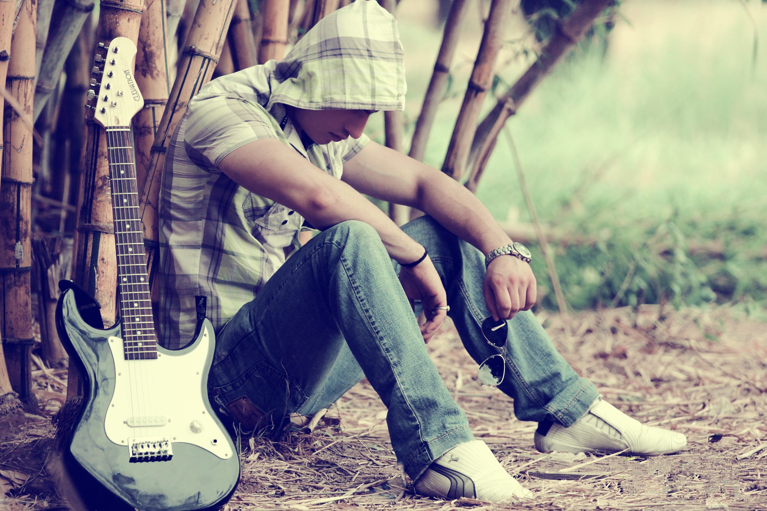 Man sitting with guitar