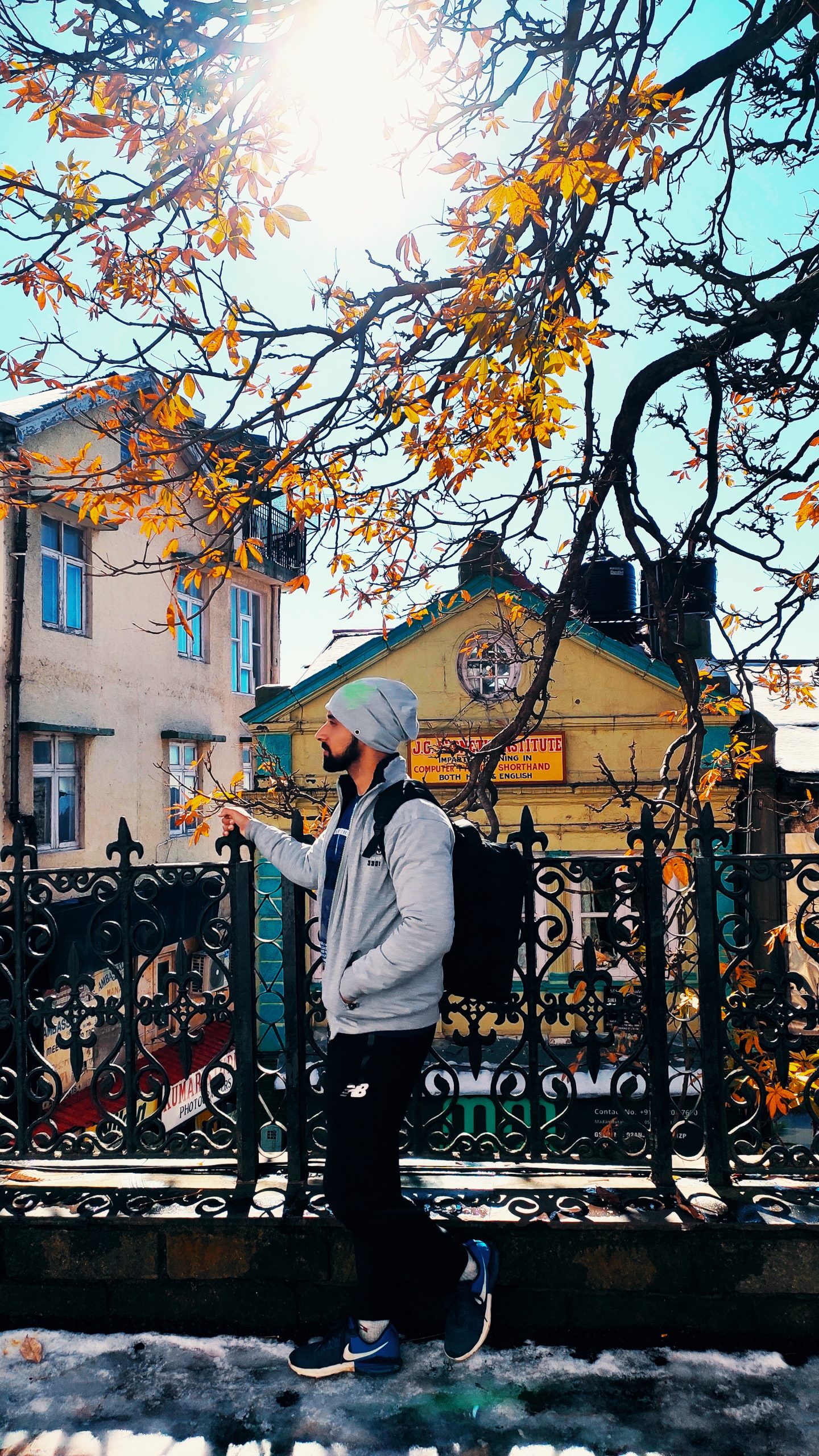 Man standing under the tree