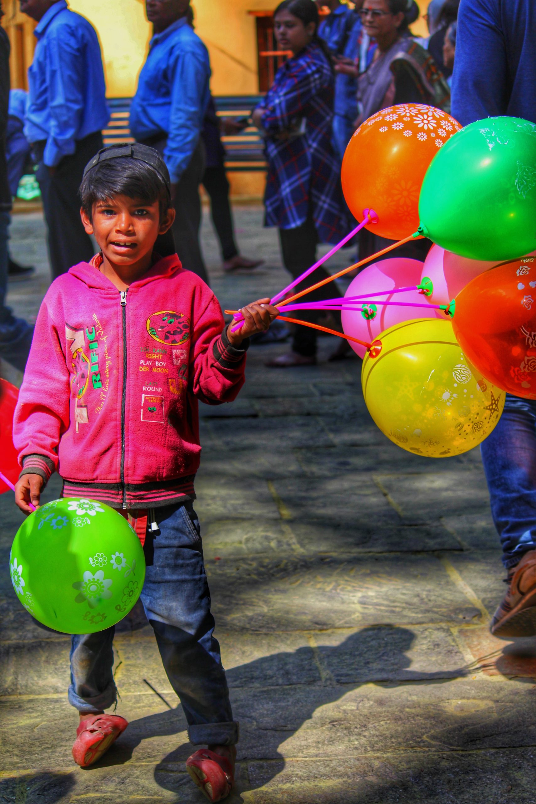 Boy Holding a Balloon