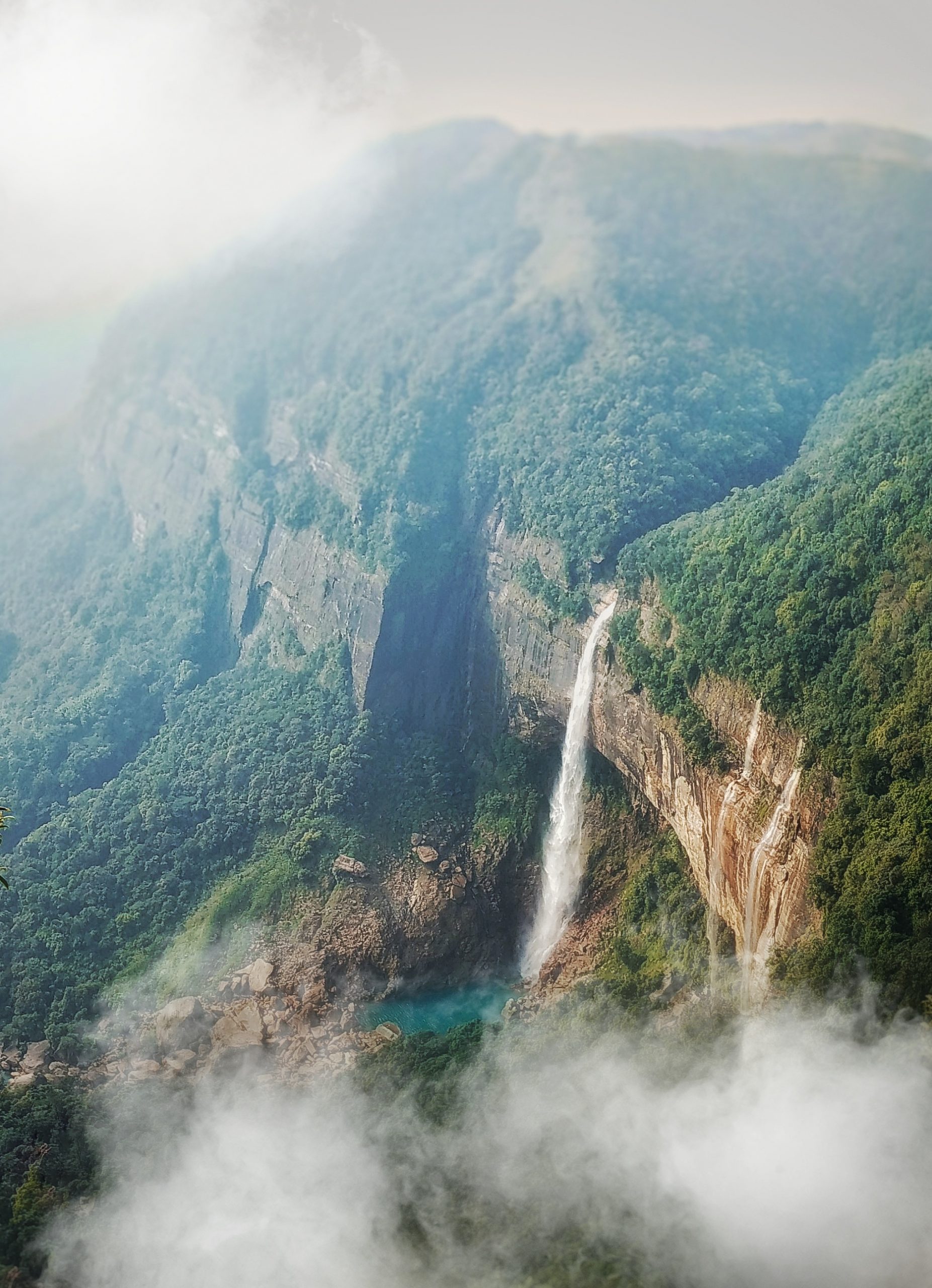 waterfalls and fog