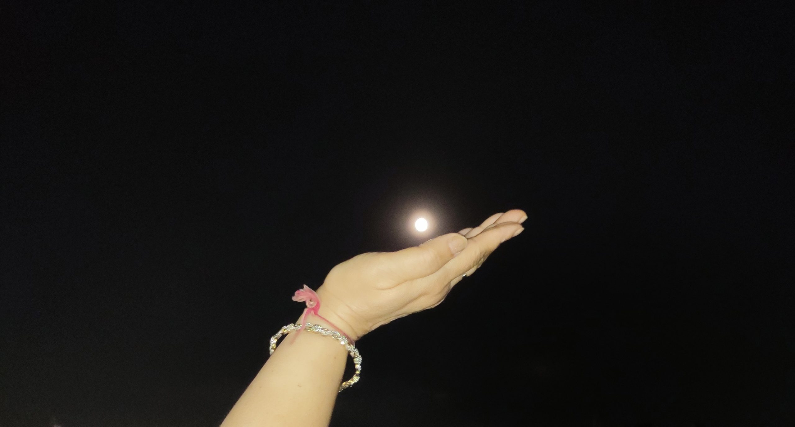 Moon in hand
