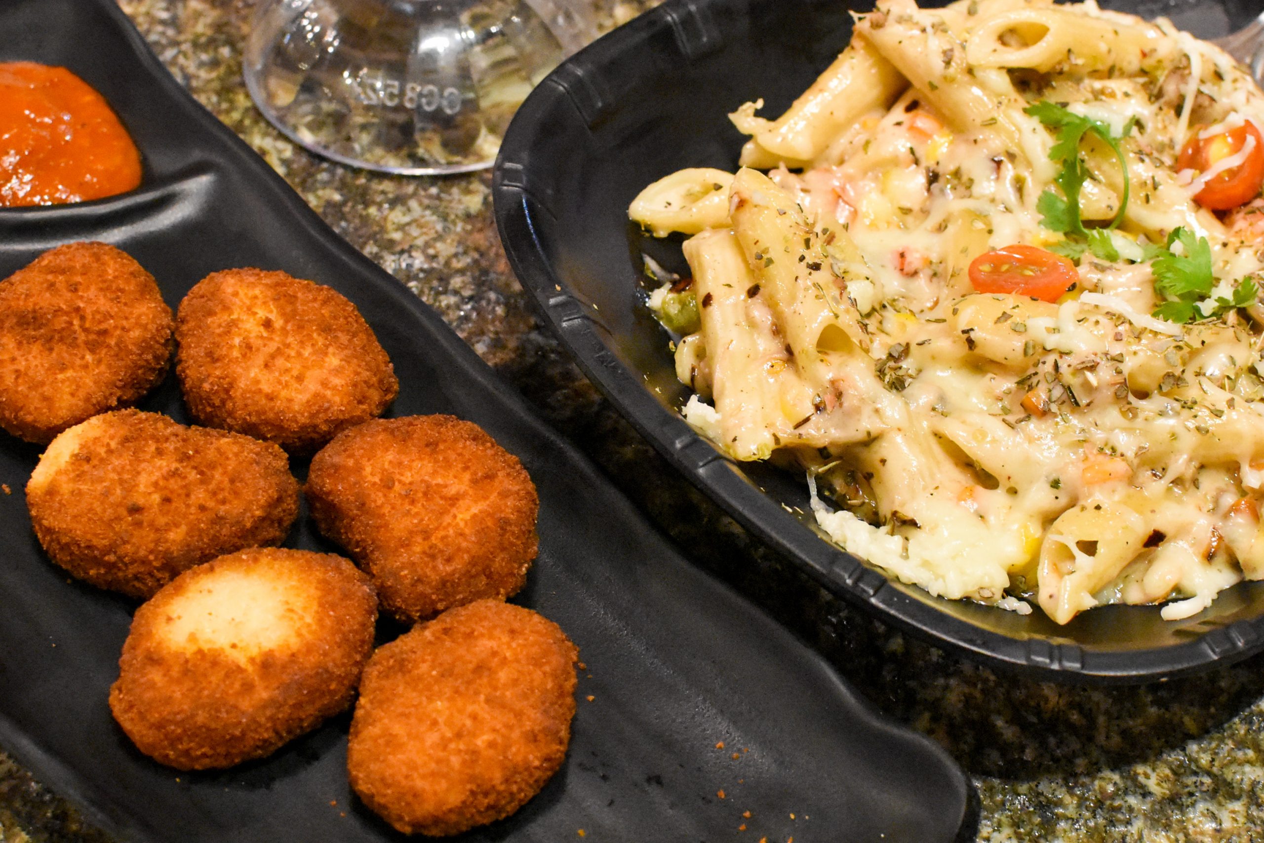Bread cutlet and pasta appetizer