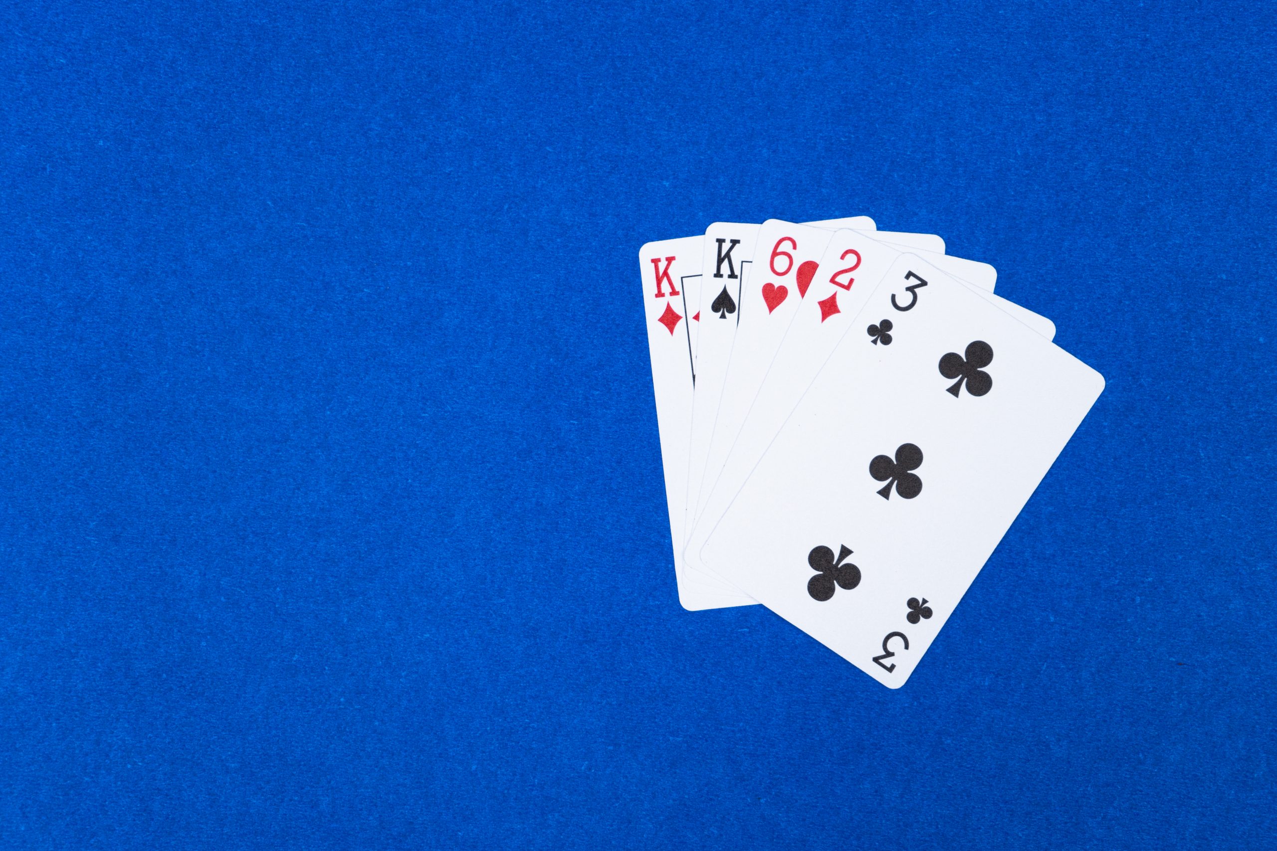 Poker one pair on blue background