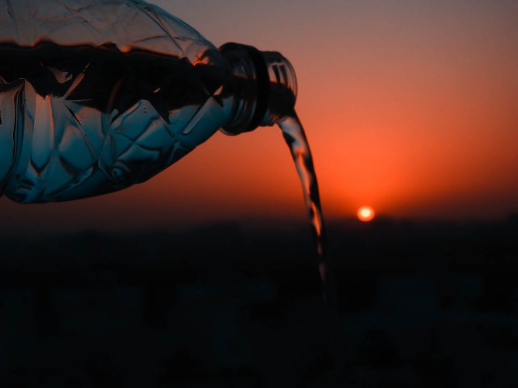 Pouring Water During Sunset - Pixahive