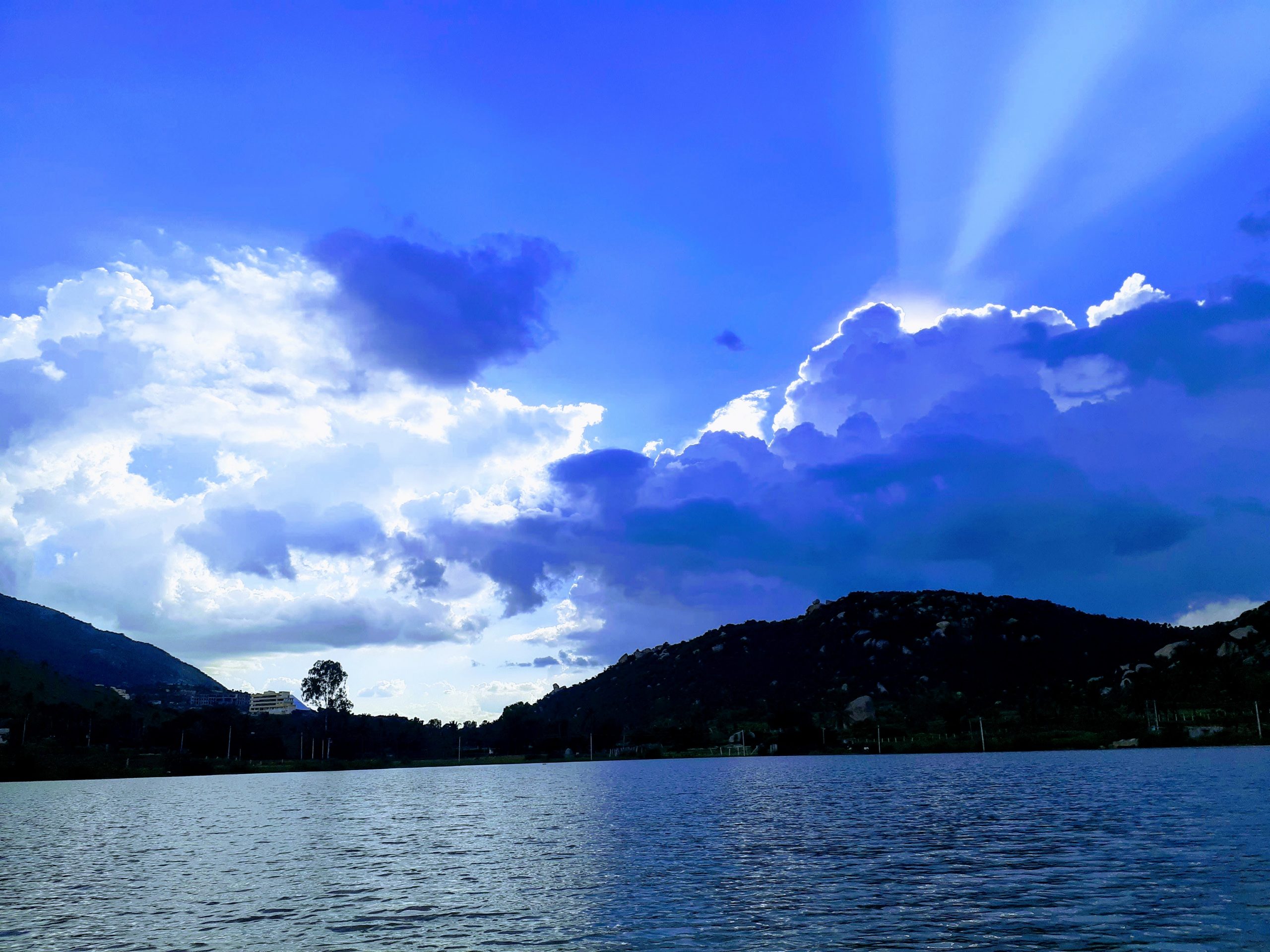 Summer sunset through a lake