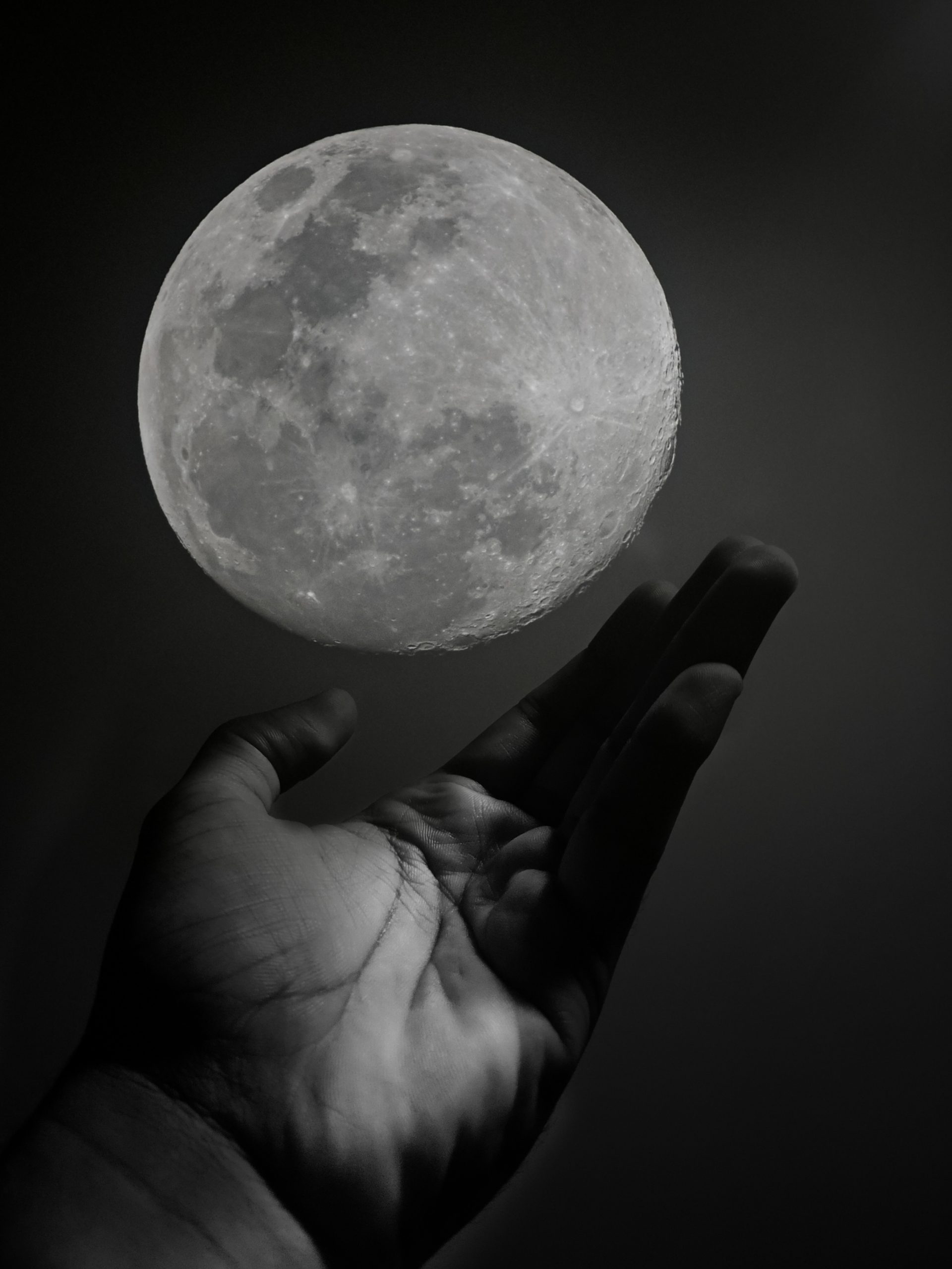 Moon in the hands of man.