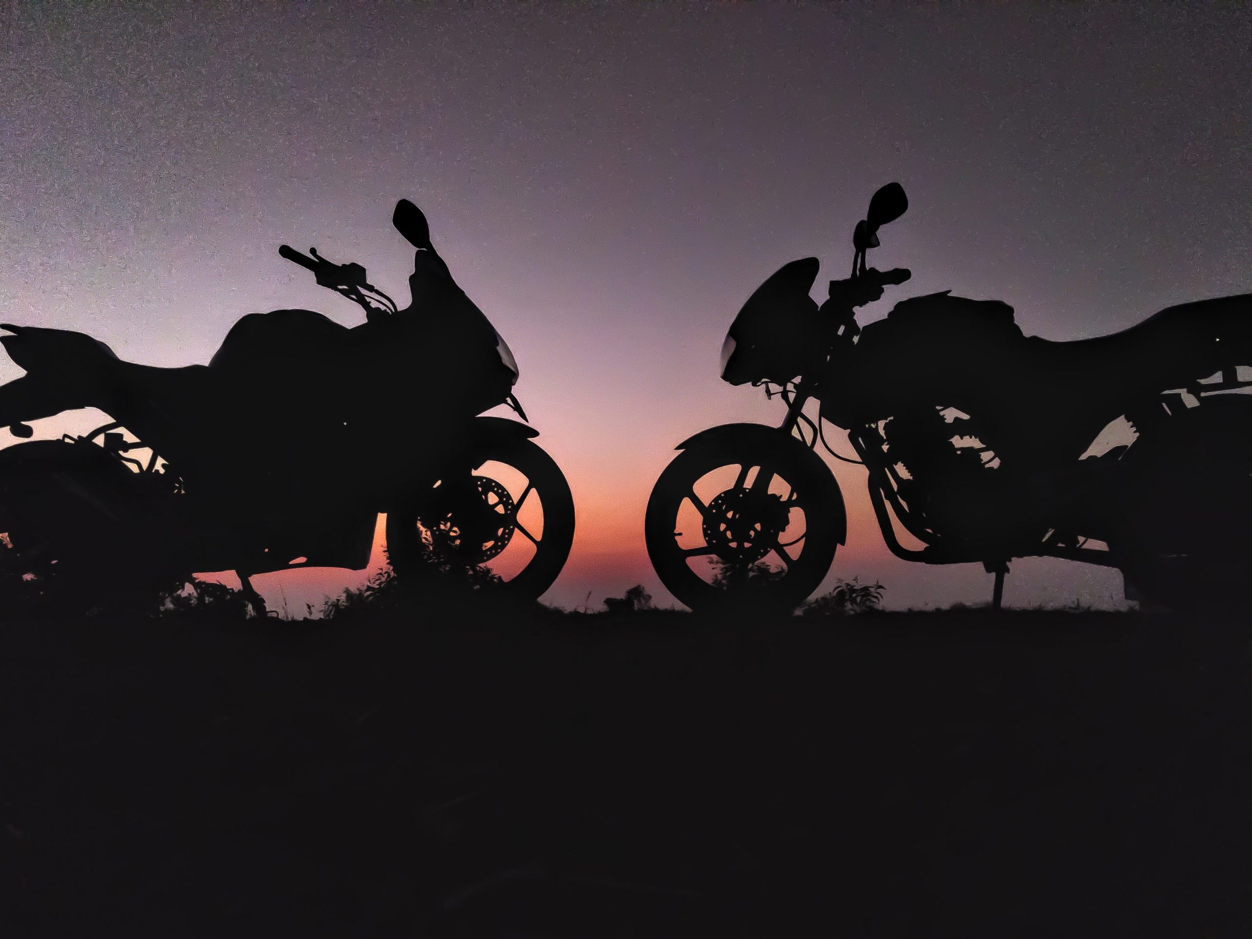 Two Motorcycle in Evening Scenery