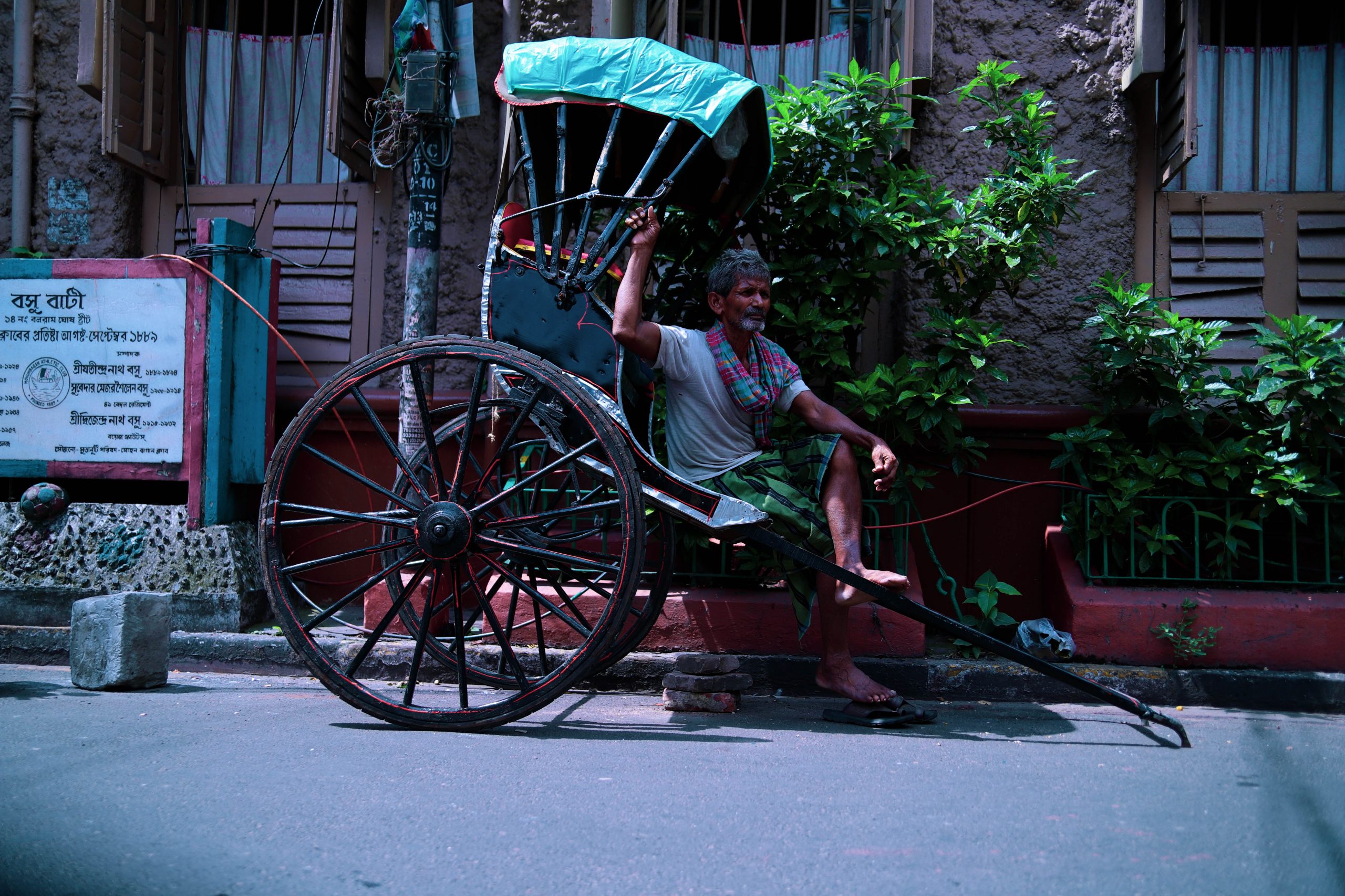 Man sitting on a rickshaw