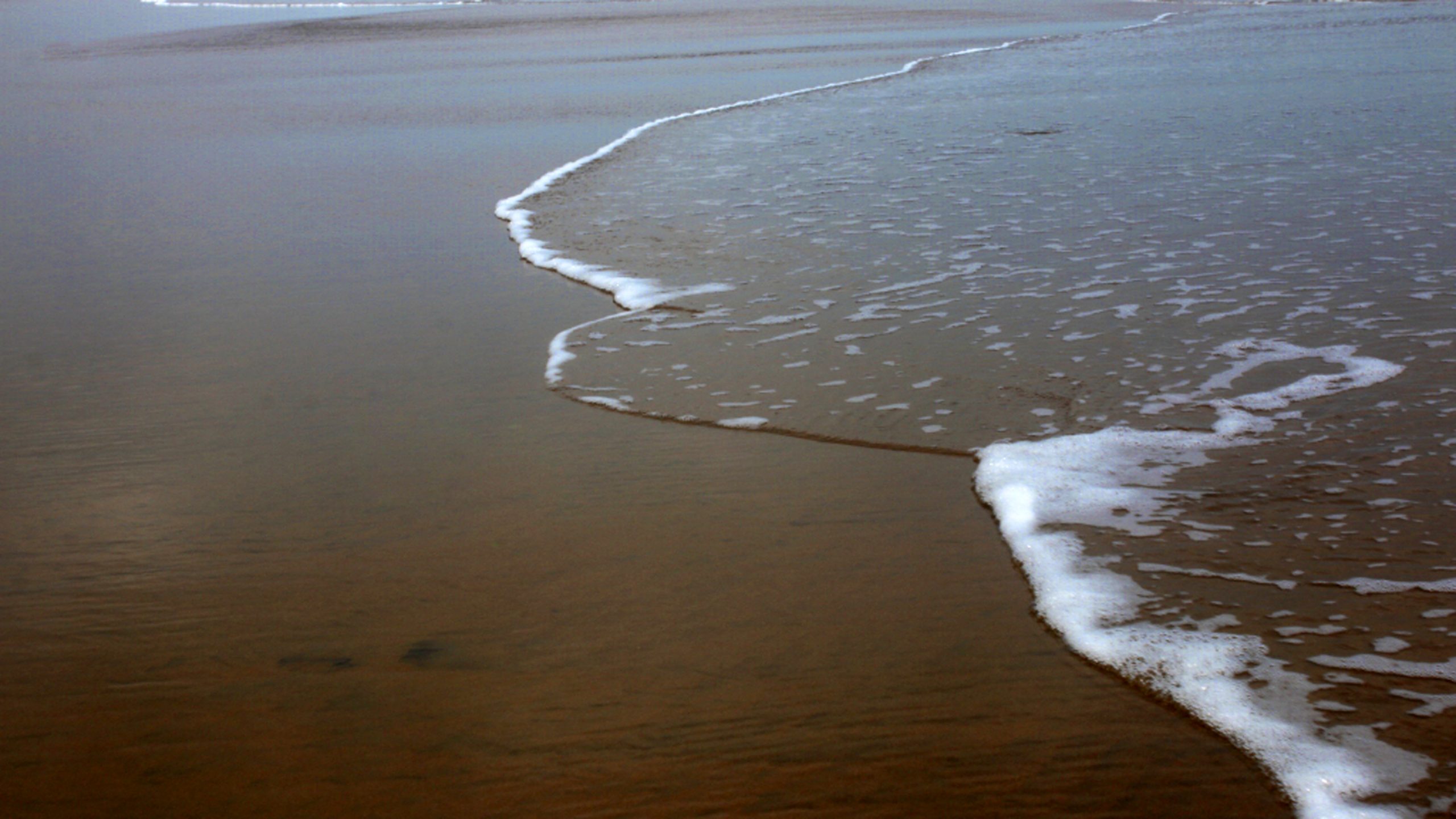 Waves reaching the beach