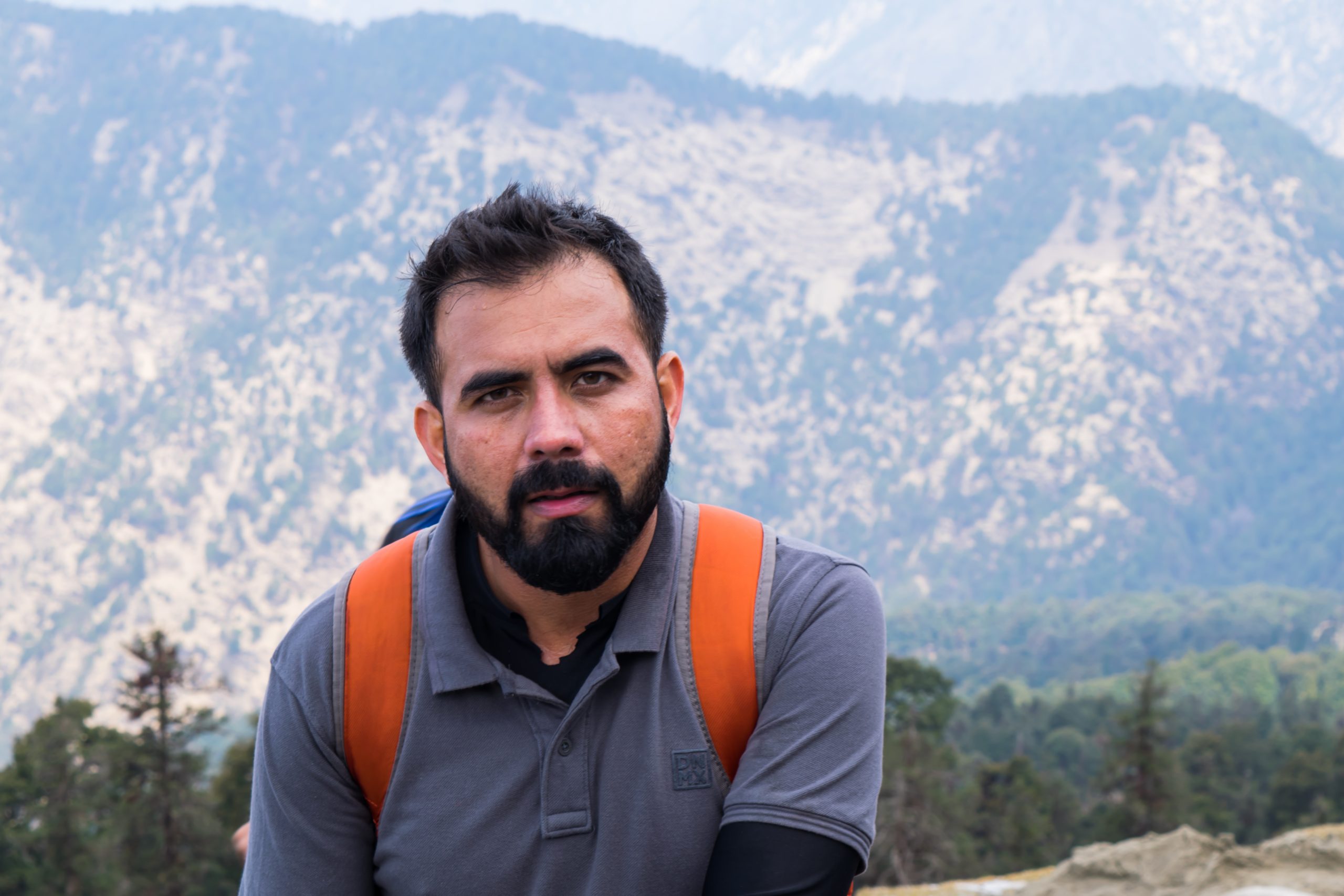 A man trekking in the hills