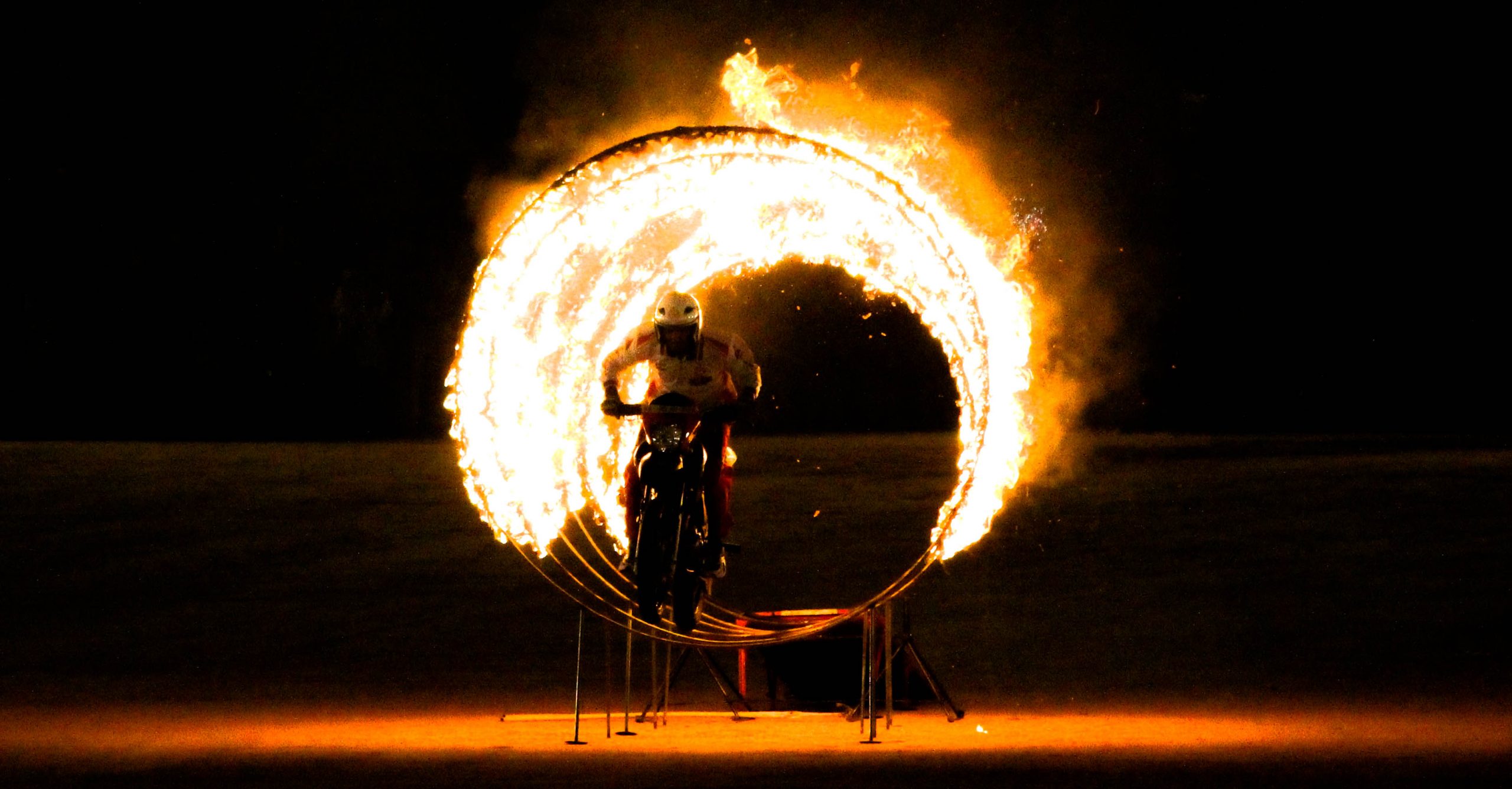 A biker passing through ring of fire