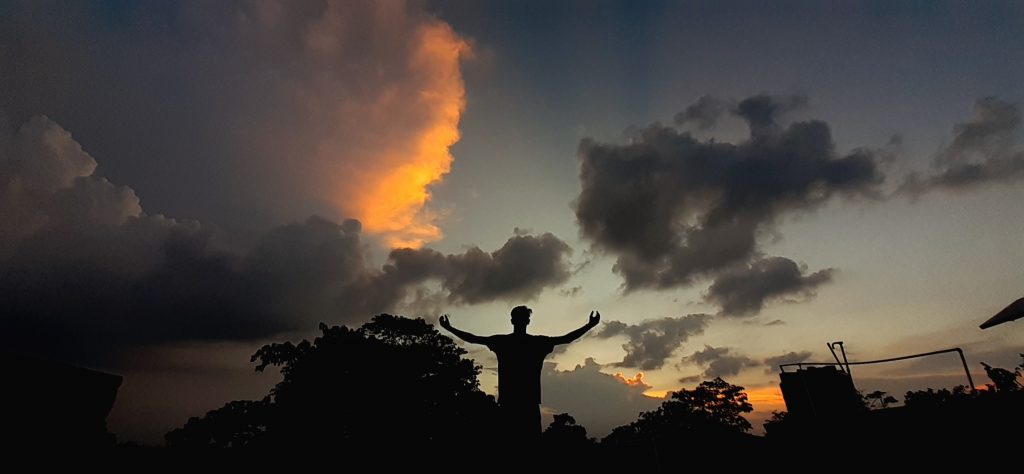 A boy enjoying sunset - PixaHive