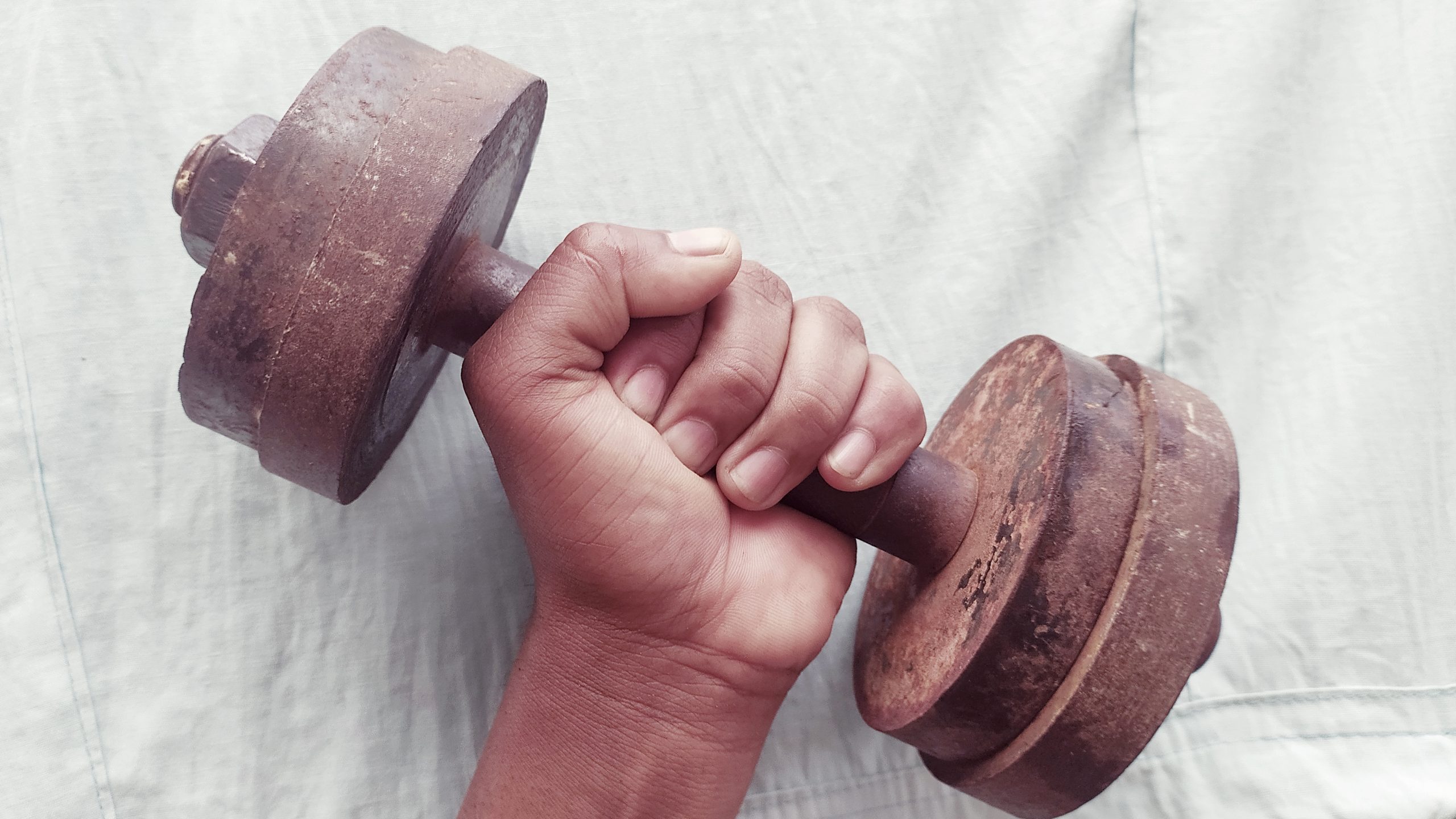 A dumbbell in hand