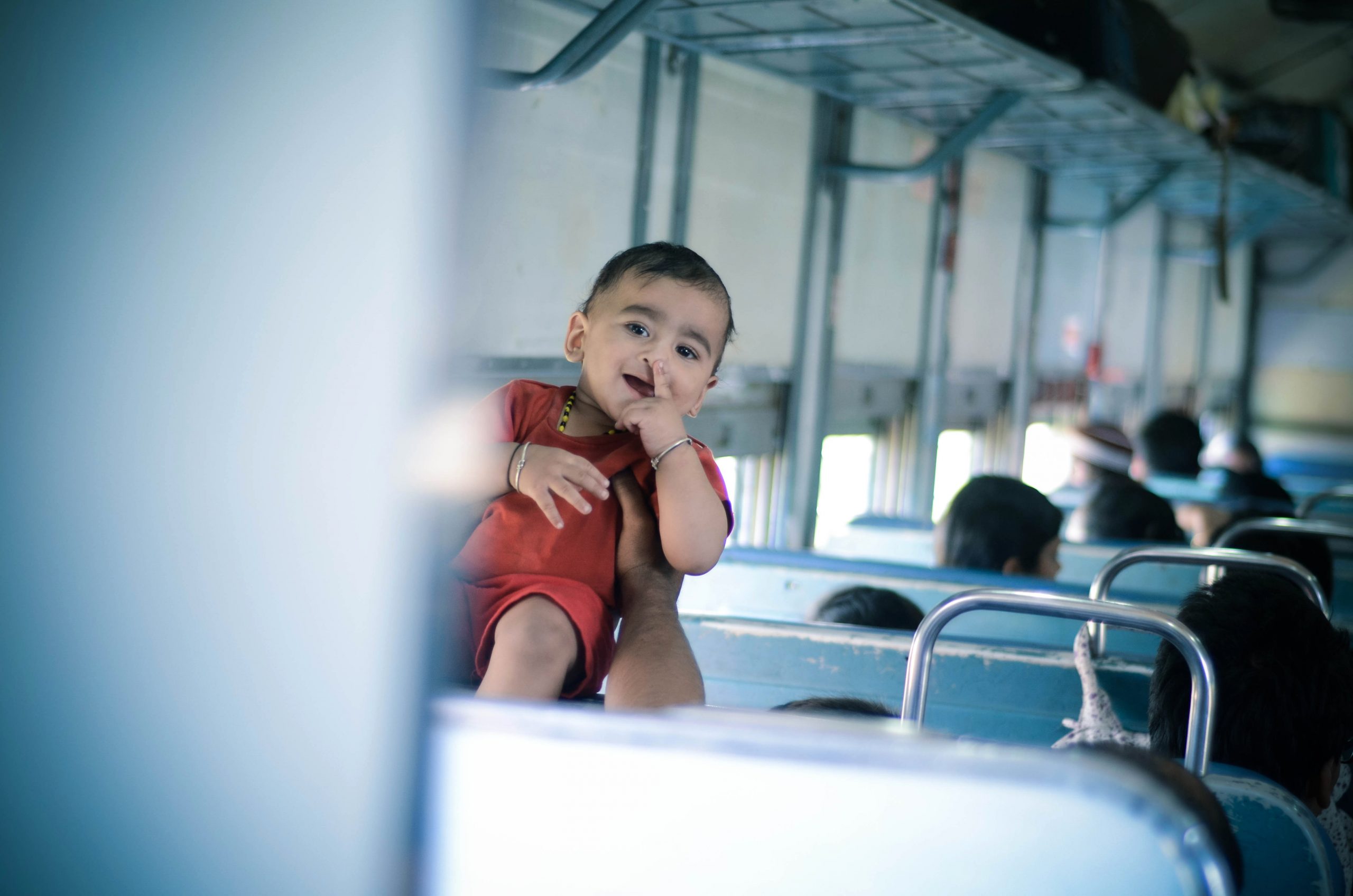 A kid in a passenger train